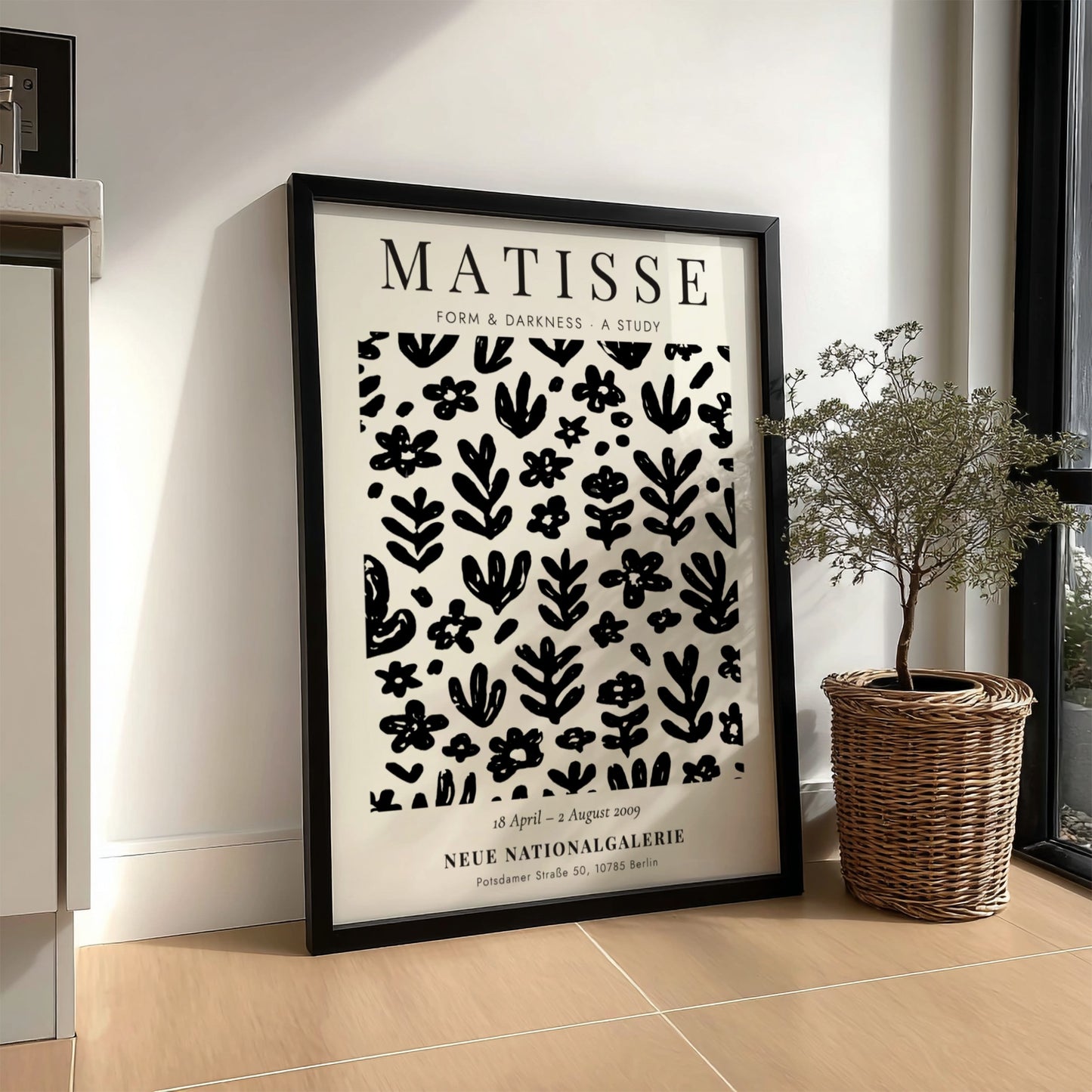 Floral pattern poster featuring black shapes and motifs, inspired by Henri Matisse, ideal for modern decor.