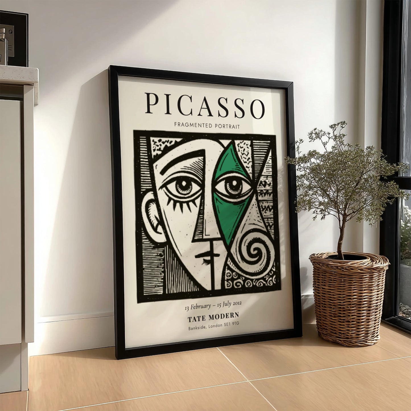 Fragmented portrait poster inspired by Picasso featuring geometric shapes and vibrant colors