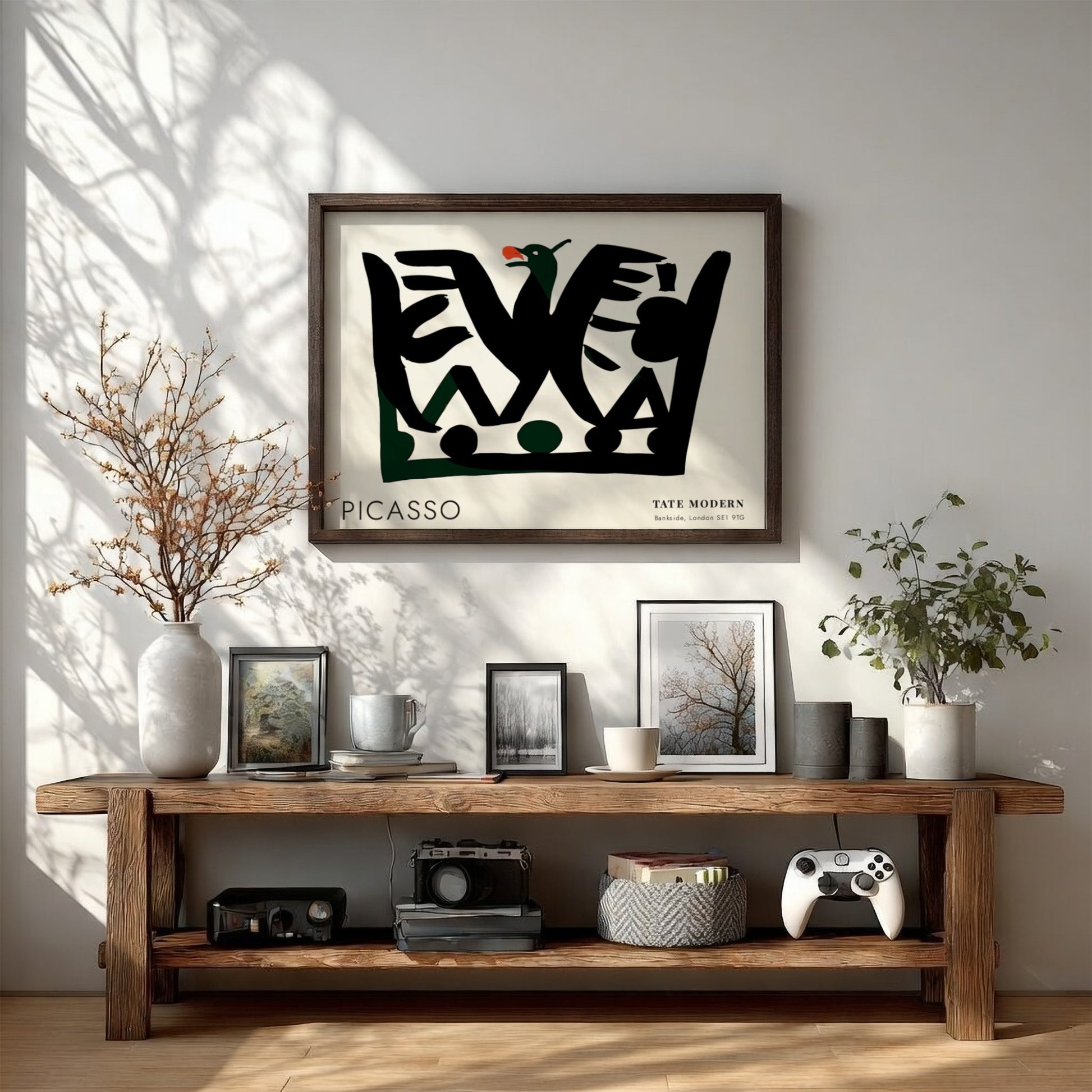 Pablo Picasso poster featuring fragmented portrait design with black shapes and green accents