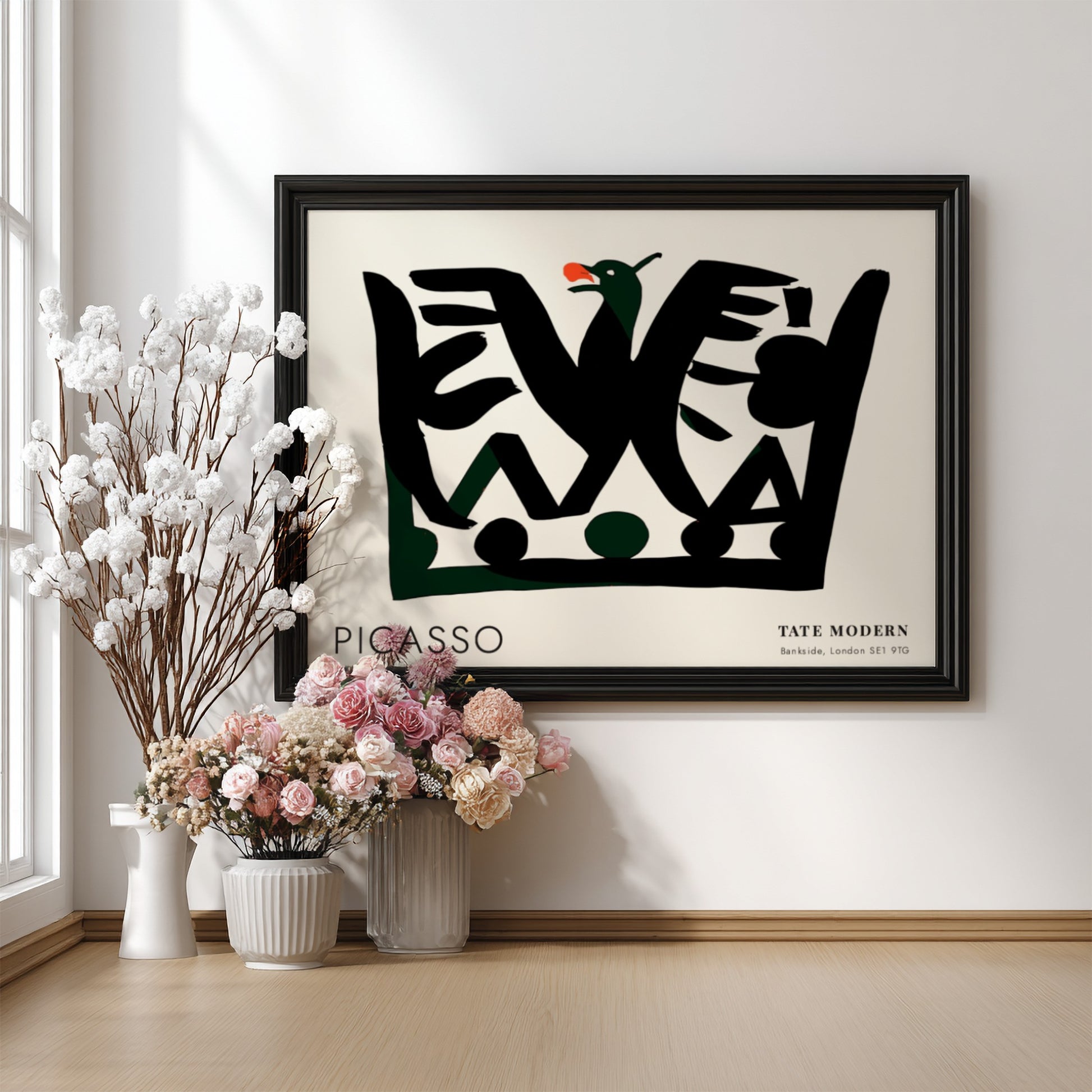 Pablo Picasso poster featuring fragmented portrait design with black shapes and green accents