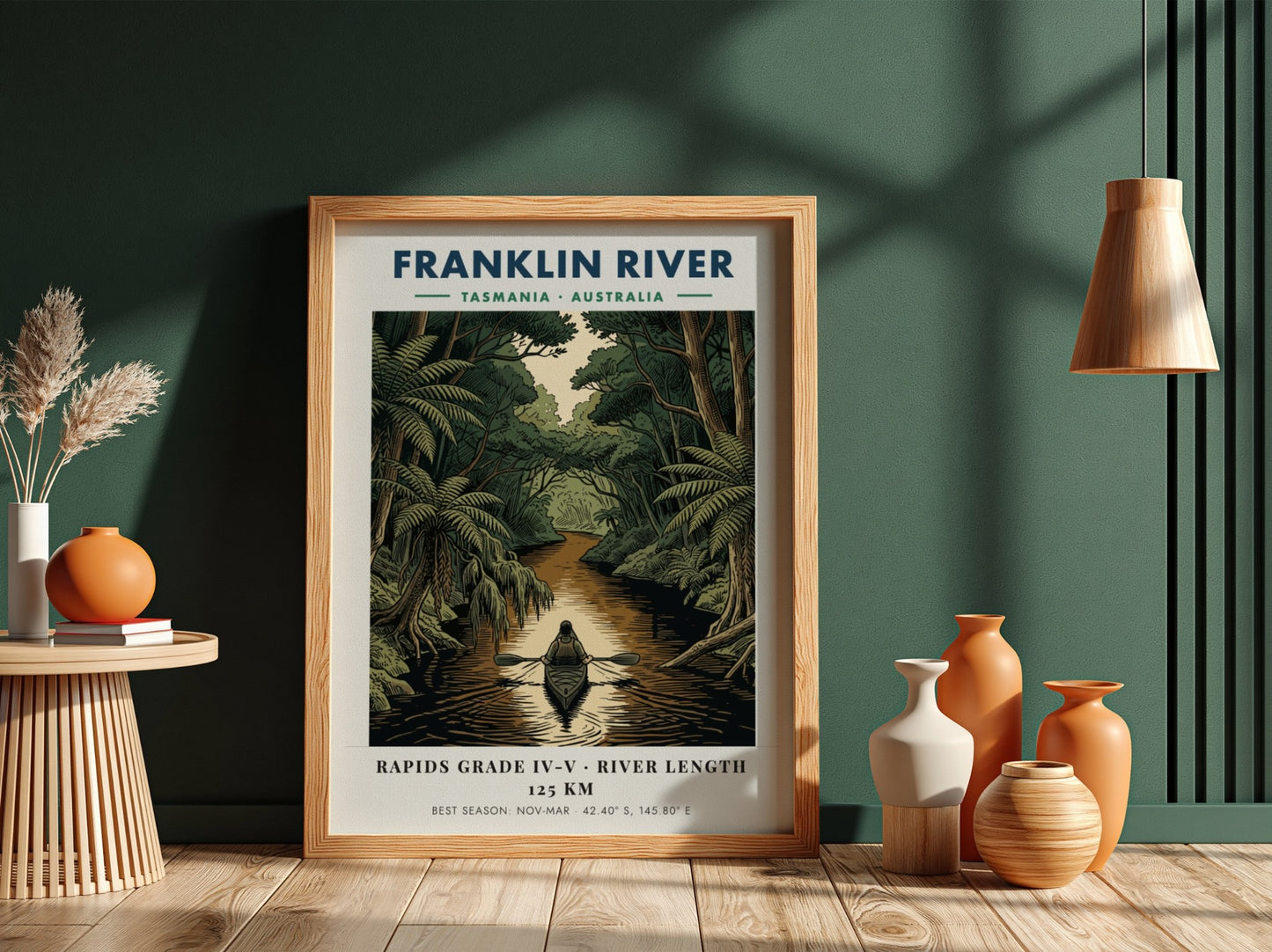 Poster featuring a solo kayaker on the Franklin River in Tasmania amidst lush forests.