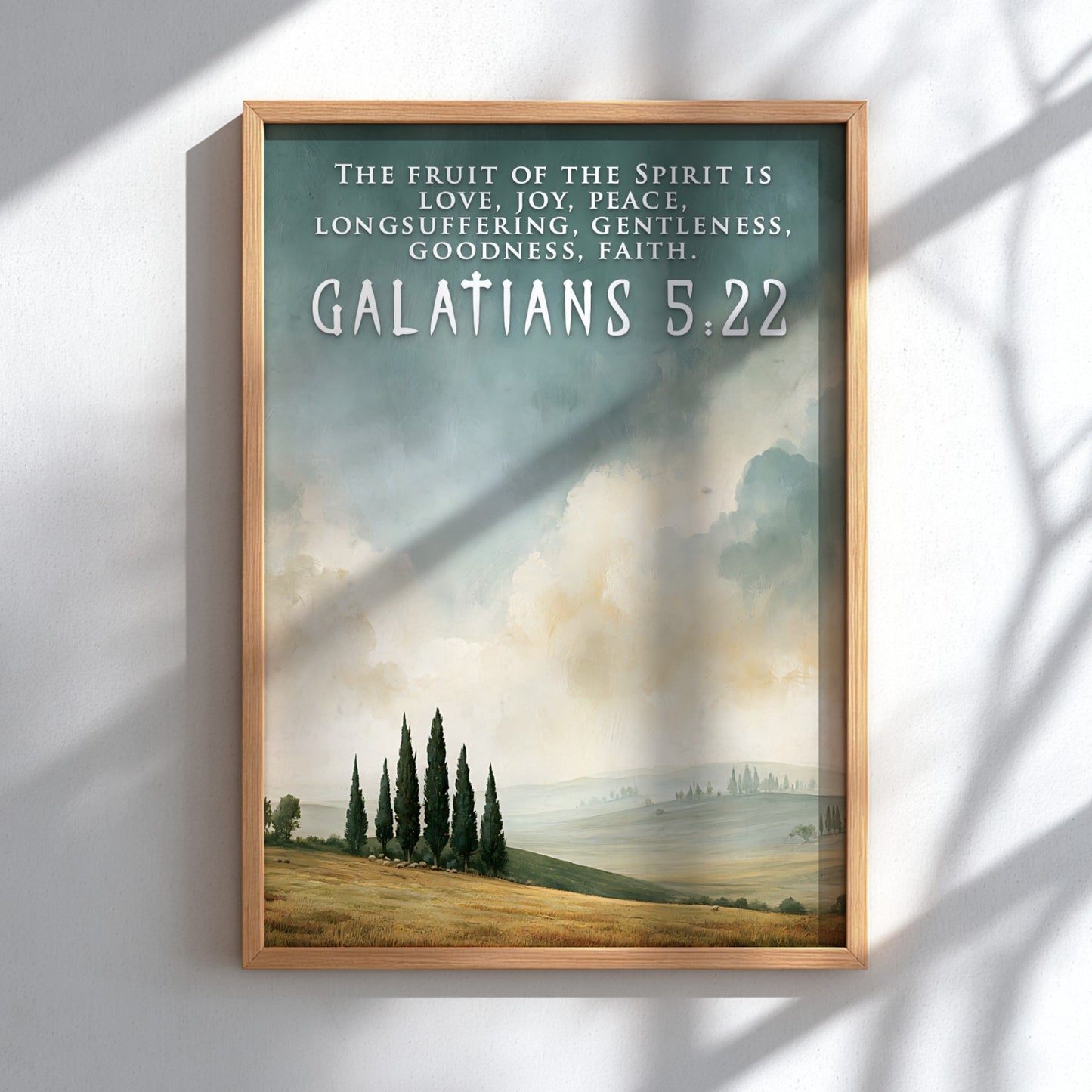 Poster displaying a peaceful countryside landscape with cypress trees and Galatians 5:22 scripture text.