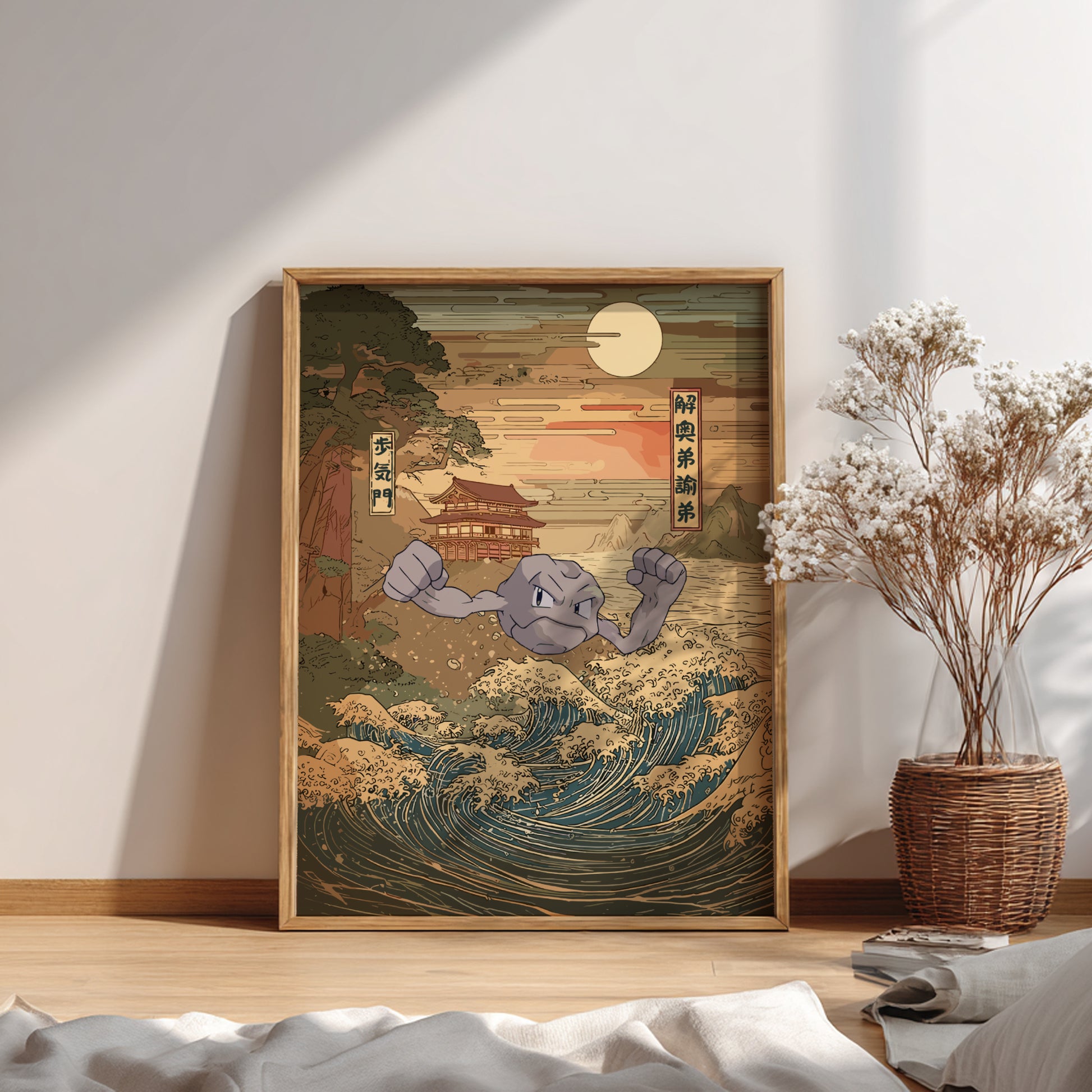 Framed artwork with Geodude Pokemon character on a wave in a room with a plant and books.