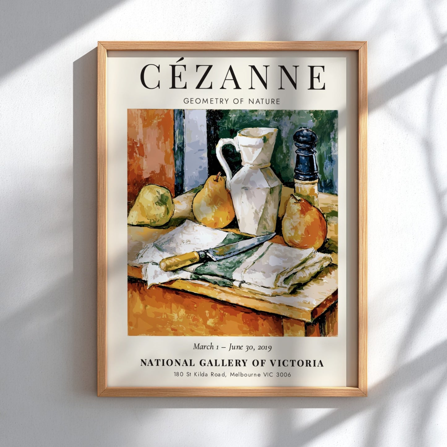 Cézanne exhibition poster featuring still life with pears and a jug in warm colors and textured brushwork