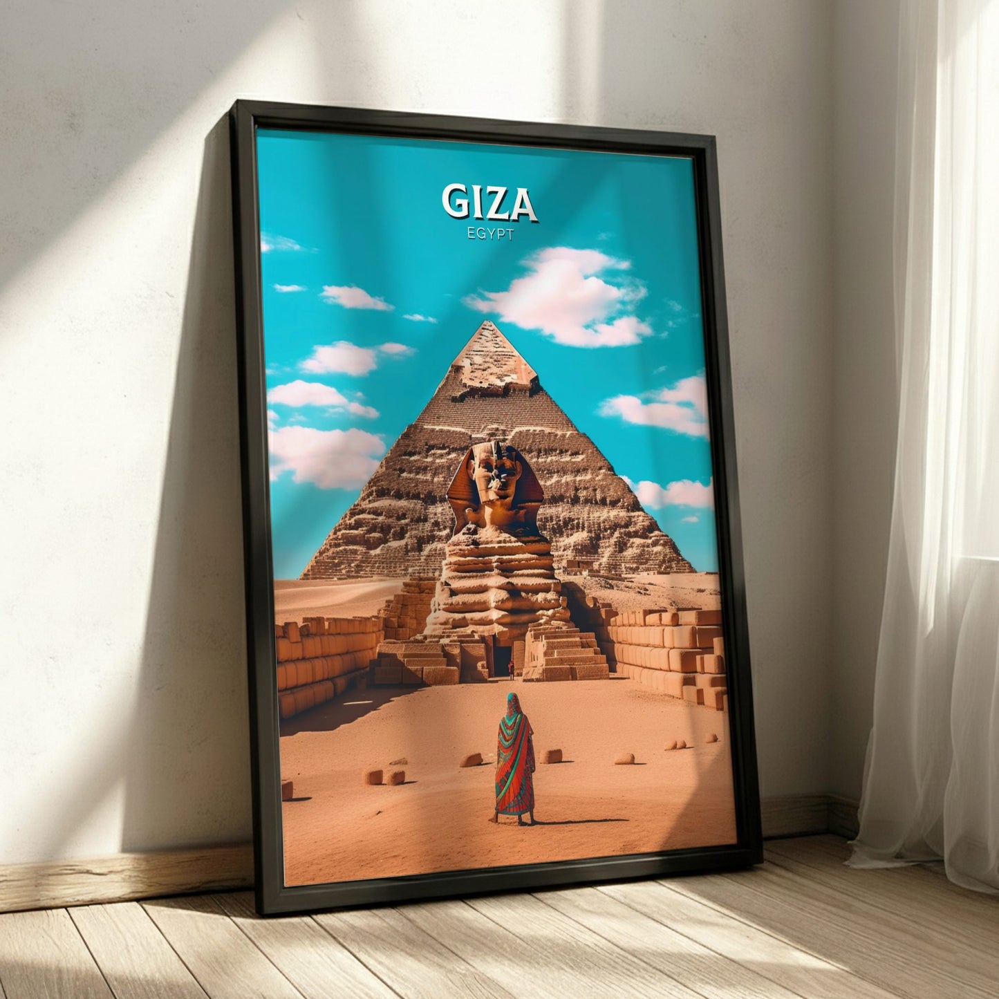 Framed poster of the Sphinx and Pyramid of Giza with 'Giza Egypt' text, displayed on a wall.