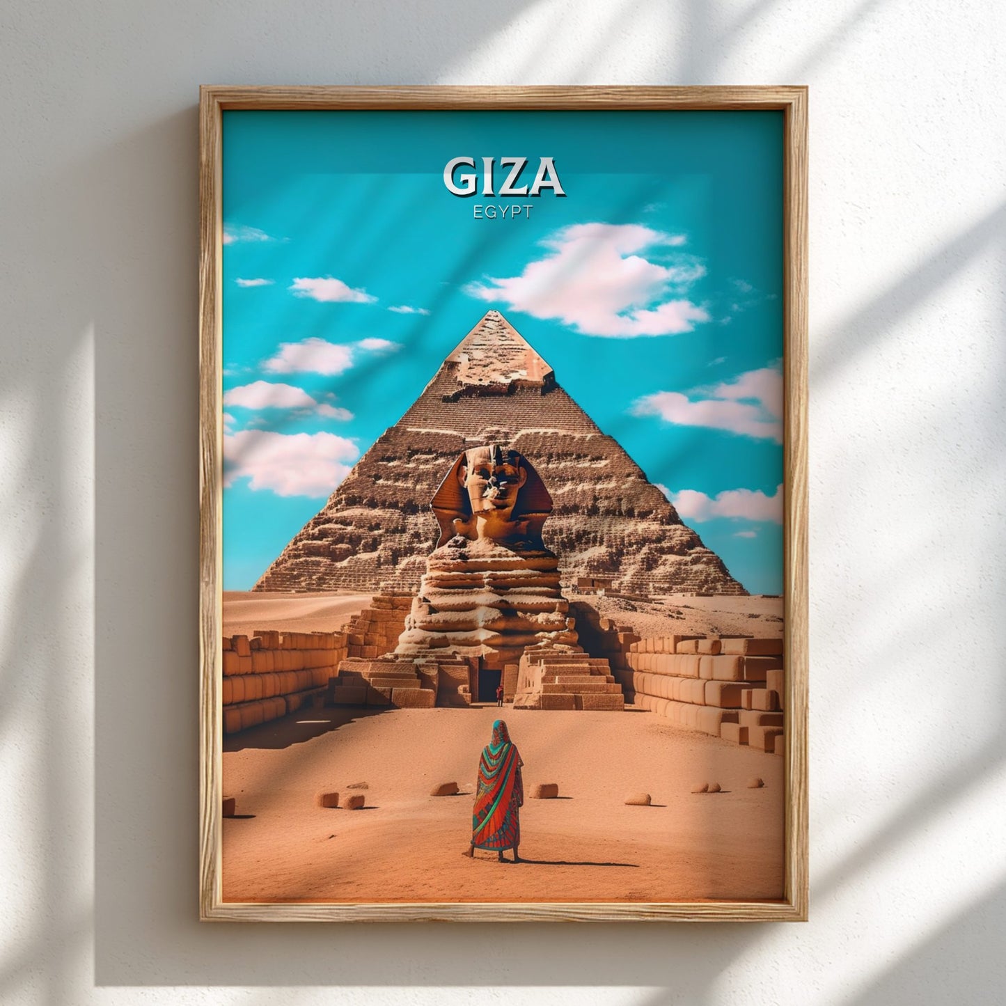 Framed poster of the Sphinx and Pyramid of Giza with 'Giza, Egypt' text on a blue sky background.