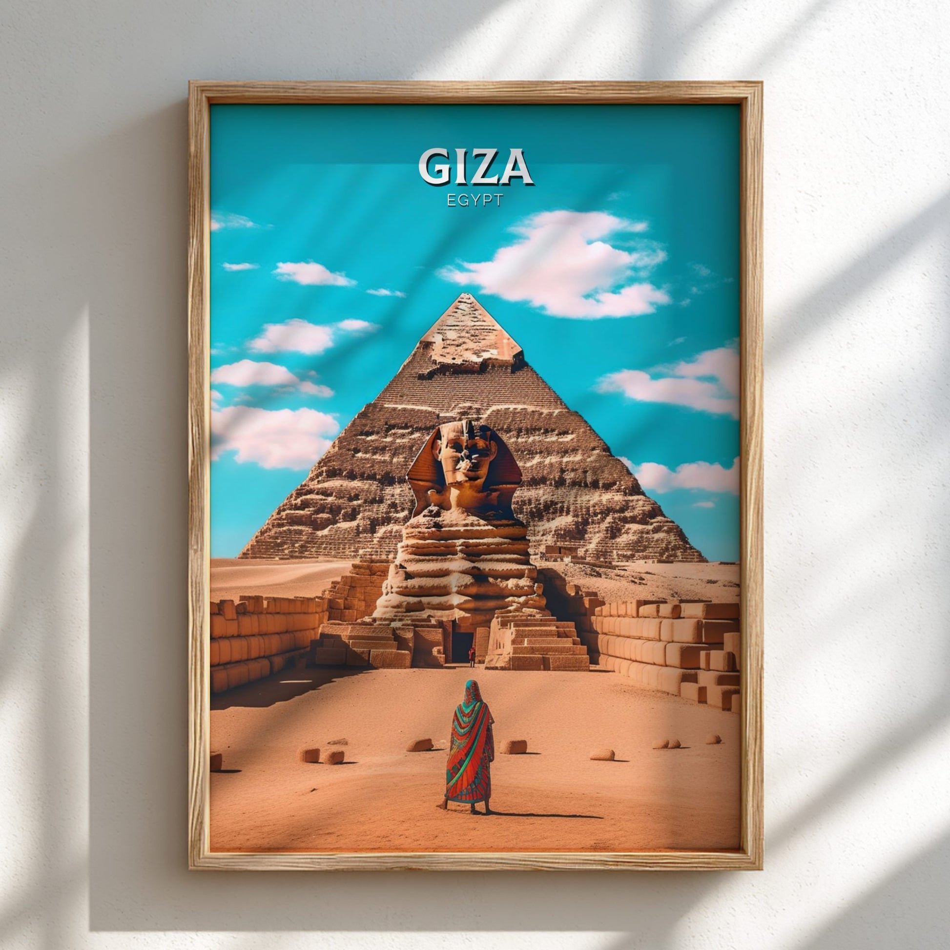 Framed poster of the Sphinx and Pyramid of Giza with 'Giza, Egypt' text on a blue sky background.
