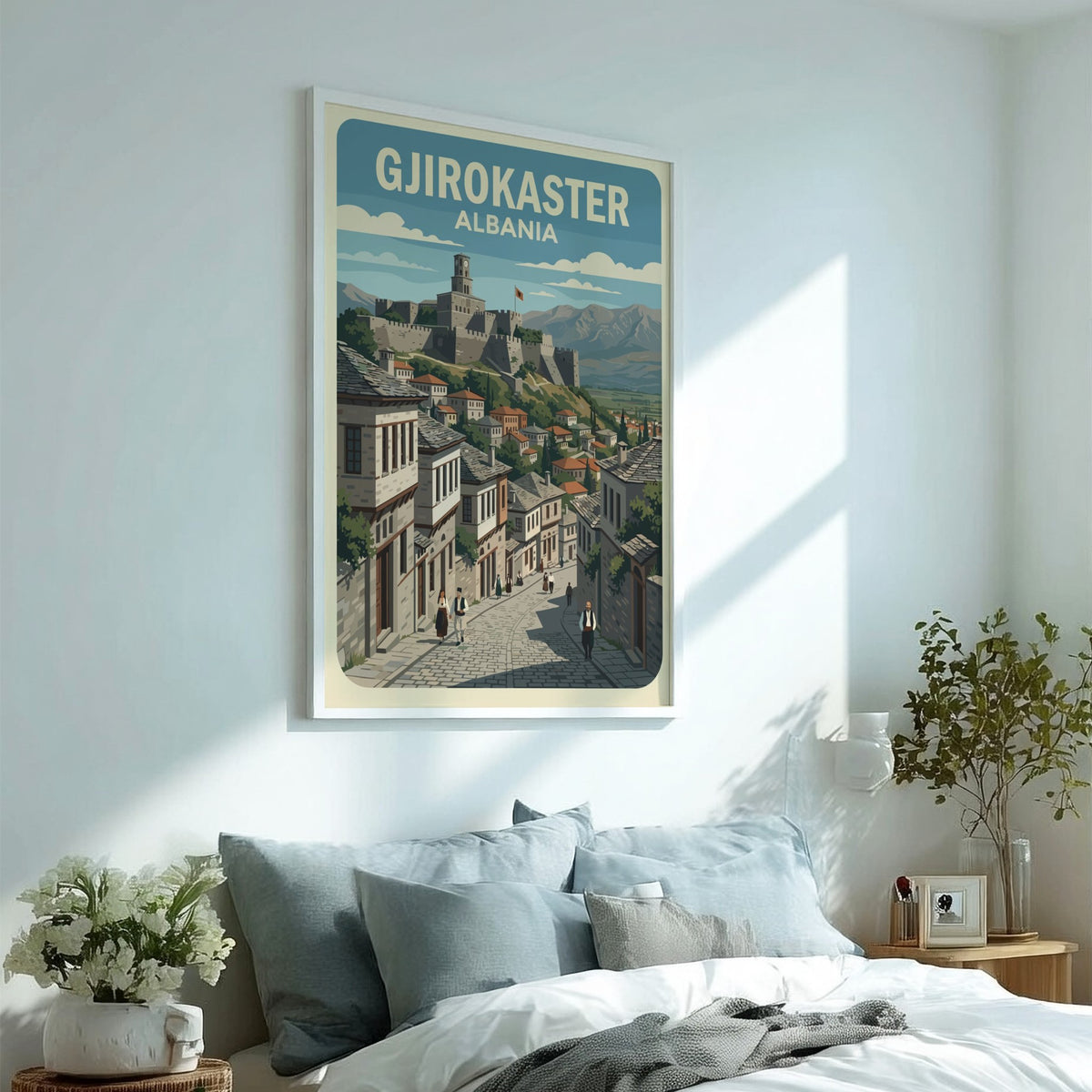 Poster of Gjirokaster Albania featuring a historic stone castle overlooking traditional houses and mountains.