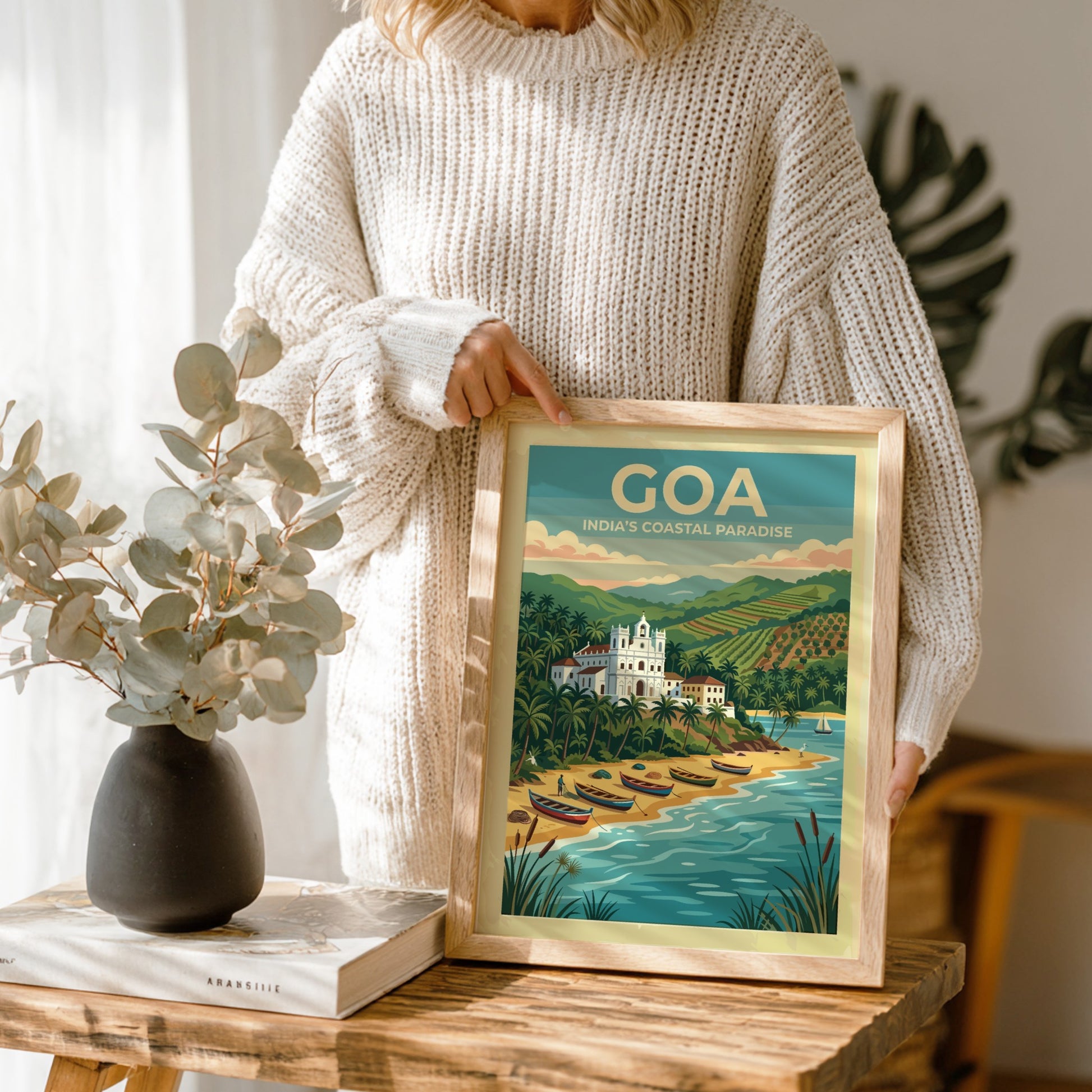 Travel poster of Goa India showing a white church, palm trees, and boats.