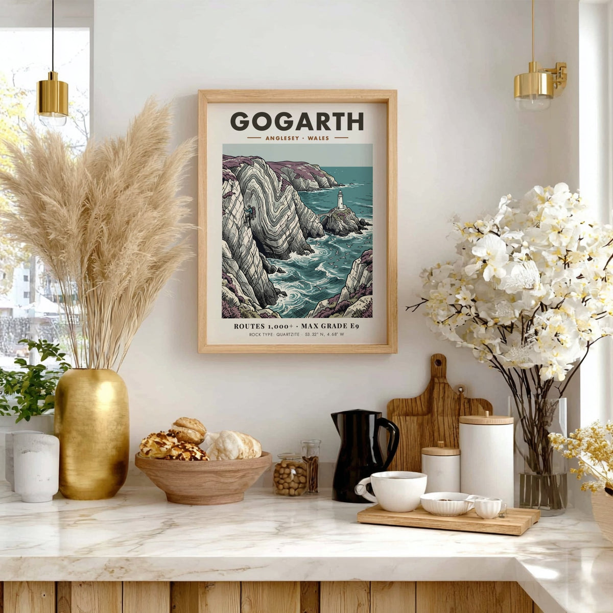Poster of a climber on Gogarth cliffs in Anglesey with a distant lighthouse view.