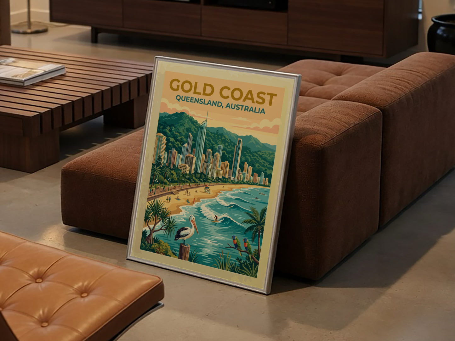 Travel poster of Gold Coast Queensland featuring high-rise buildings, sandy beach, pelican and parrots.