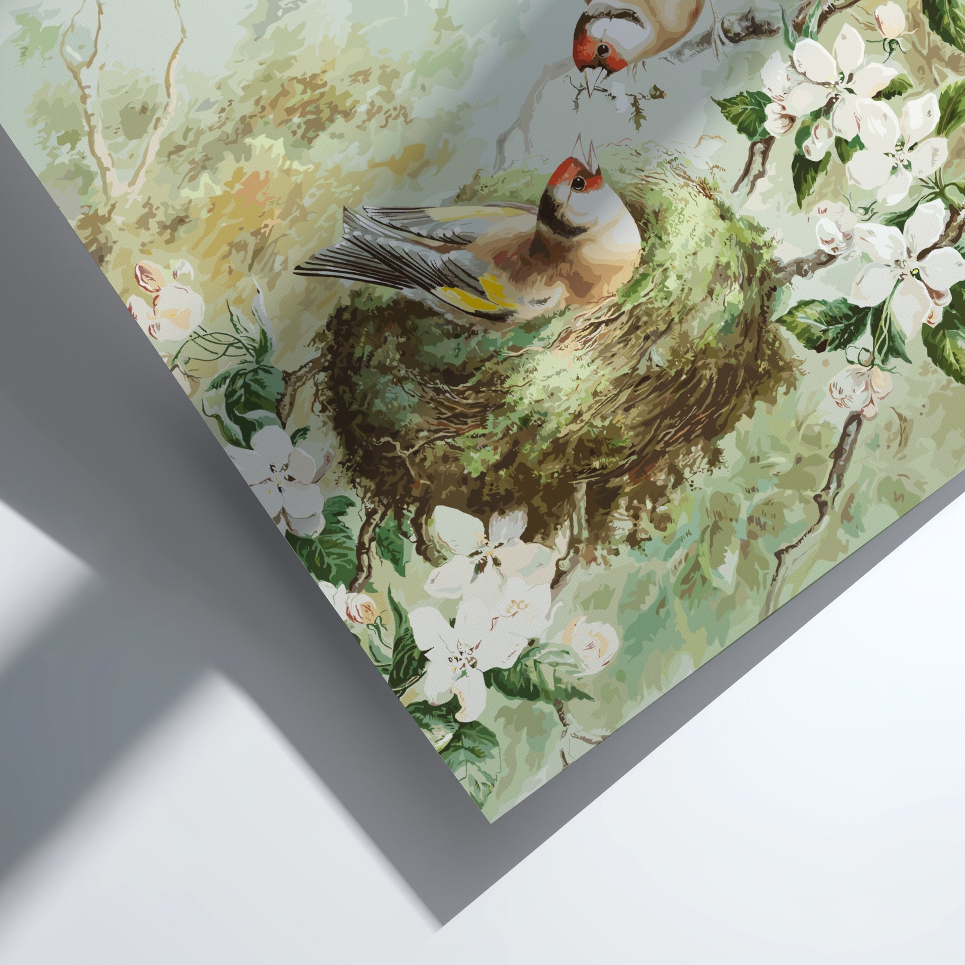 Vintage poster of Gold Finches in an apple tree nest, featuring soft greens, browns, and white blossoms.