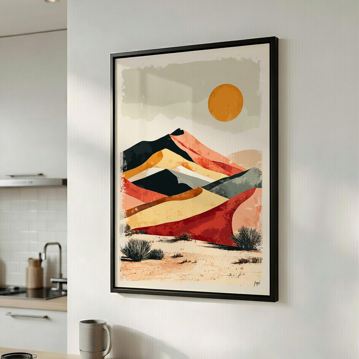 Framed abstract landscape art on a wall in a kitchen