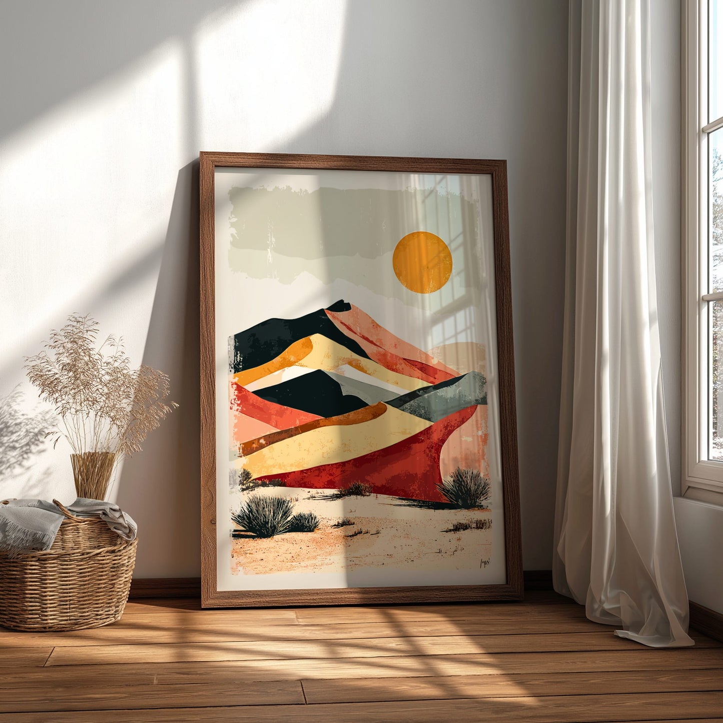 Framed abstract landscape art on a wall with natural light