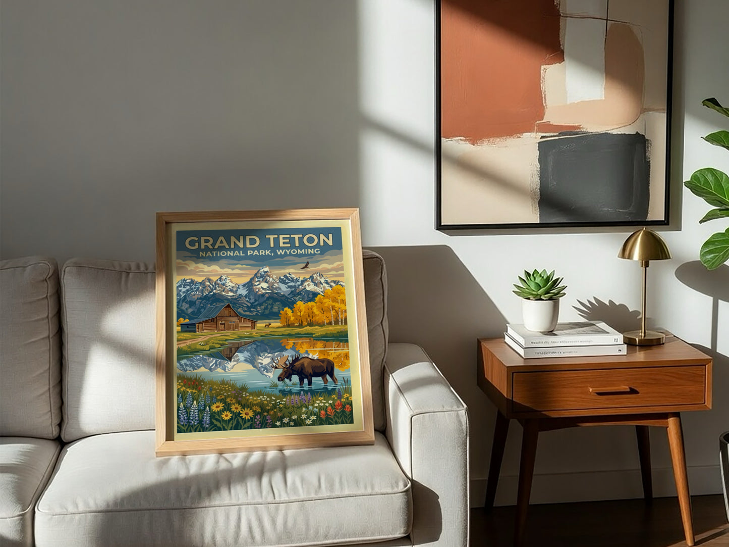 Travel poster of Grand Teton National Park featuring a moose, barn, and mountains.