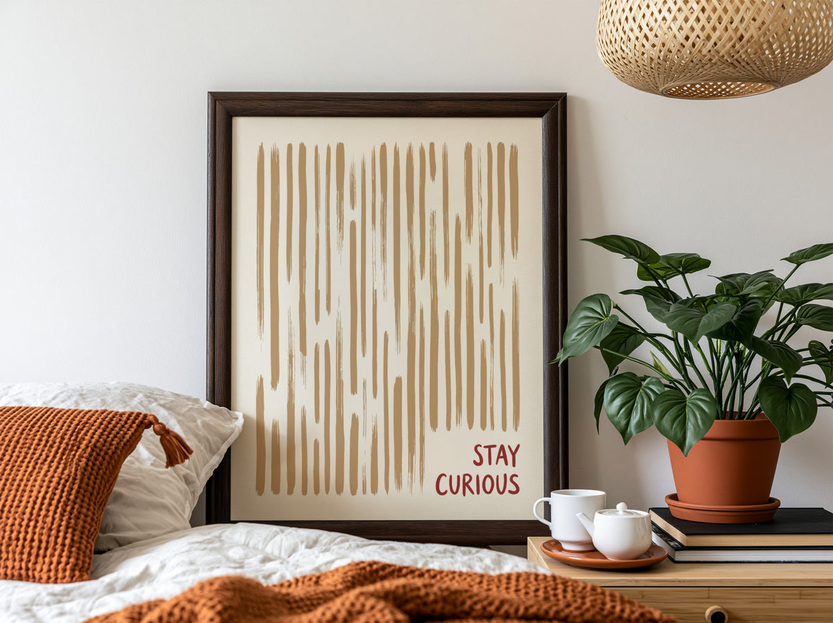 Motivational poster featuring vertical tan brushstrokes and the words Stay Curious in red.