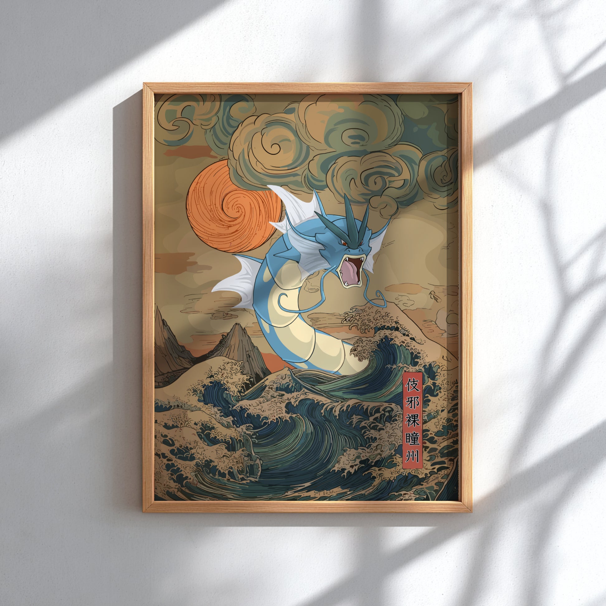 Framed artwork of Gyarados Pokemon with a stylized landscape on a white wall.