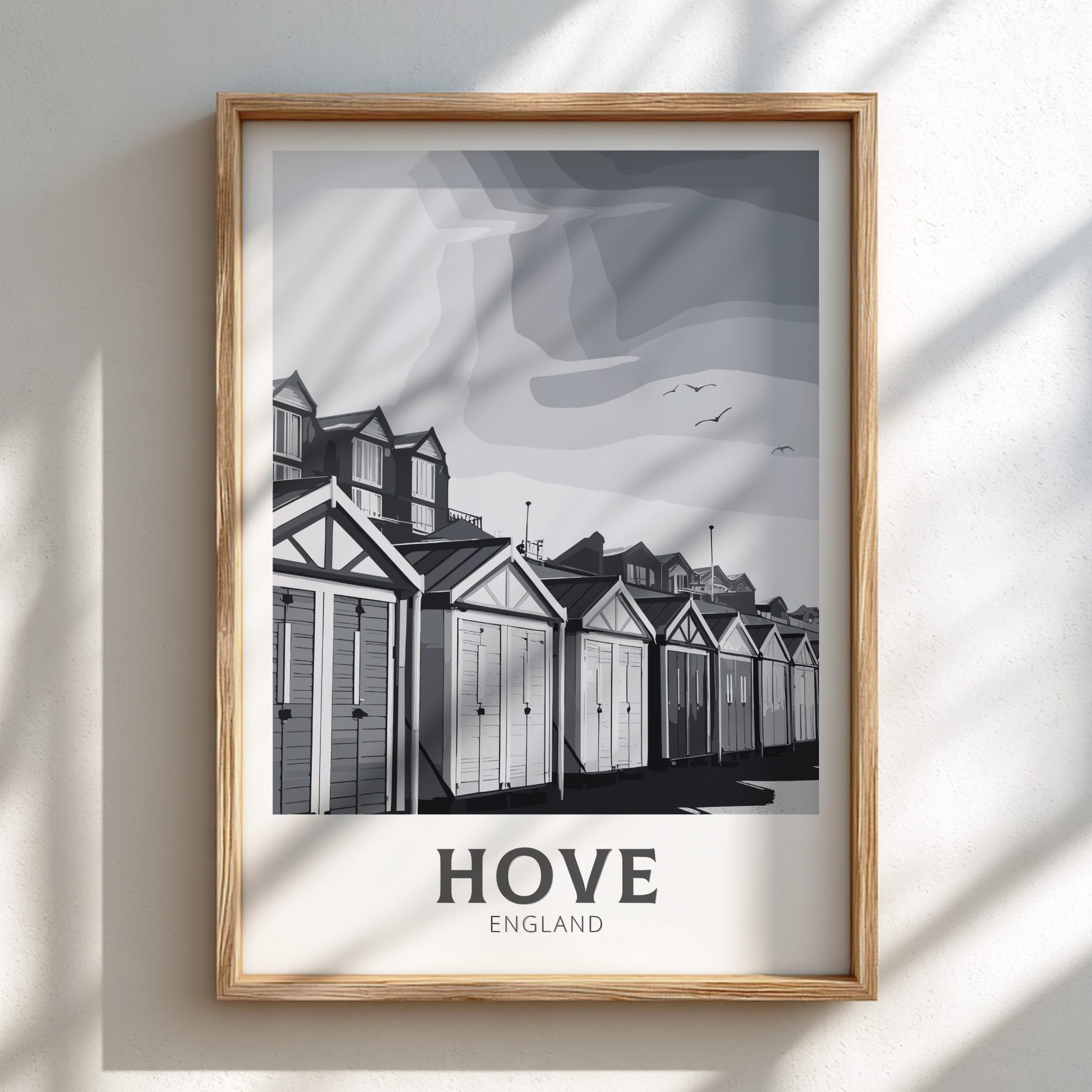 Hove black and white travel poster on a natural oak frame