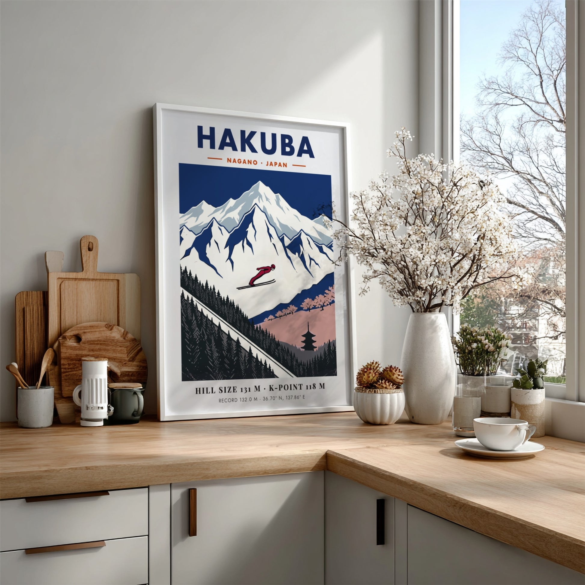Poster showing a ski jumper flying over snowy mountains and a Japanese pagoda