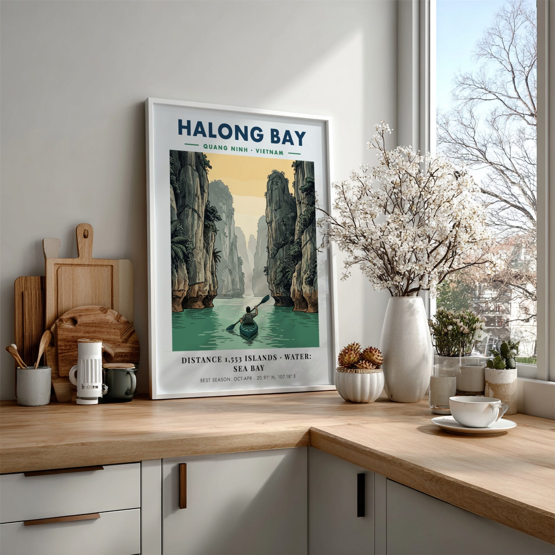 Poster showing a lone kayaker rowing through calm water between towering Halong Bay cliffs.