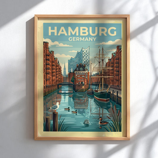 Travel poster featuring Hamburg Germany with a sailing ship, canal, and the Elbphilharmonie building.