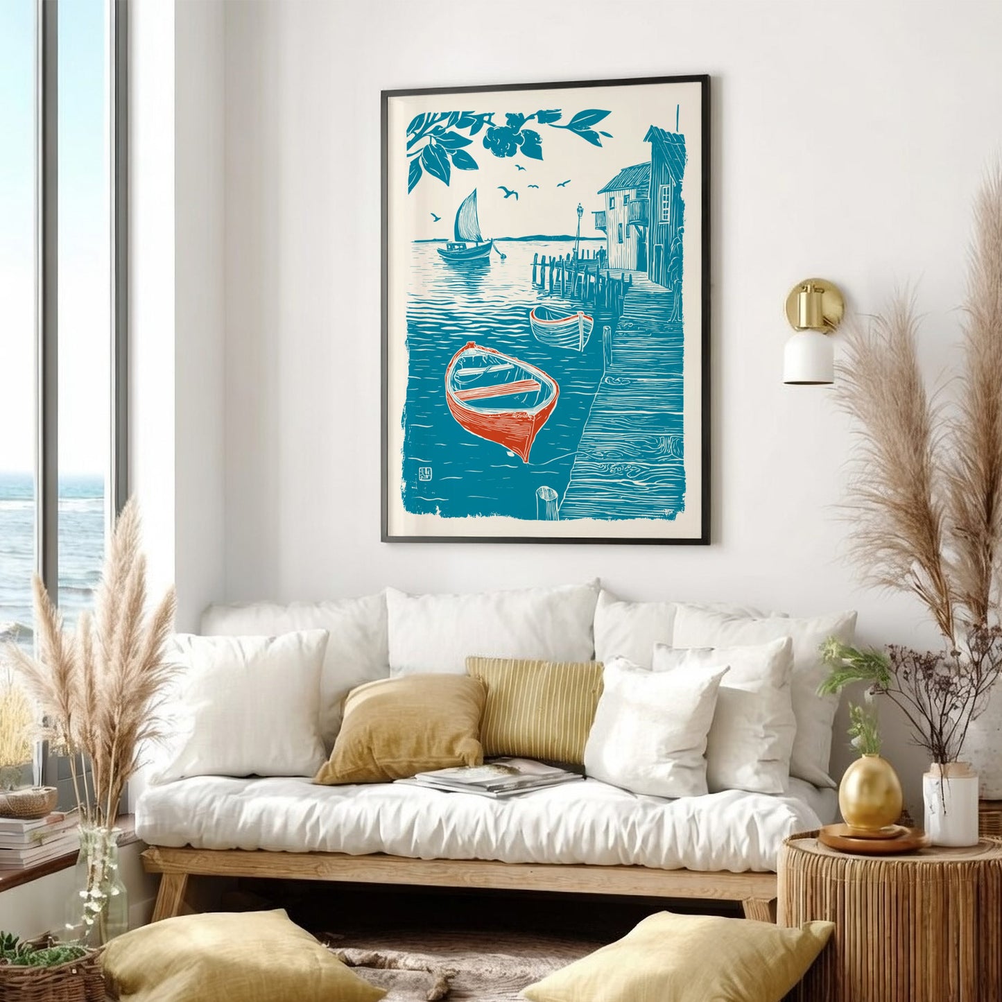 Living room with a framed artwork of a boat and dock, white sofa, and decorative elements.