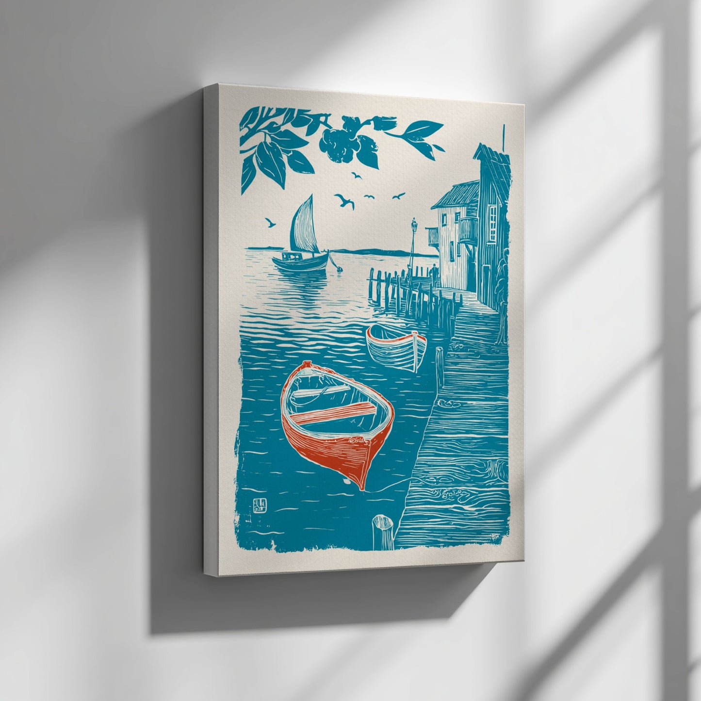 Canvas print with a coastal scene featuring boats and a house on a wall.