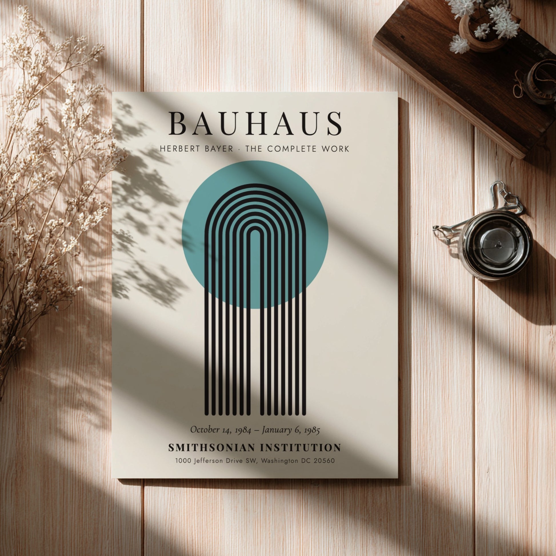 Bauhaus poster featuring Herbert Bayer's design with geometric shapes and vibrant colors