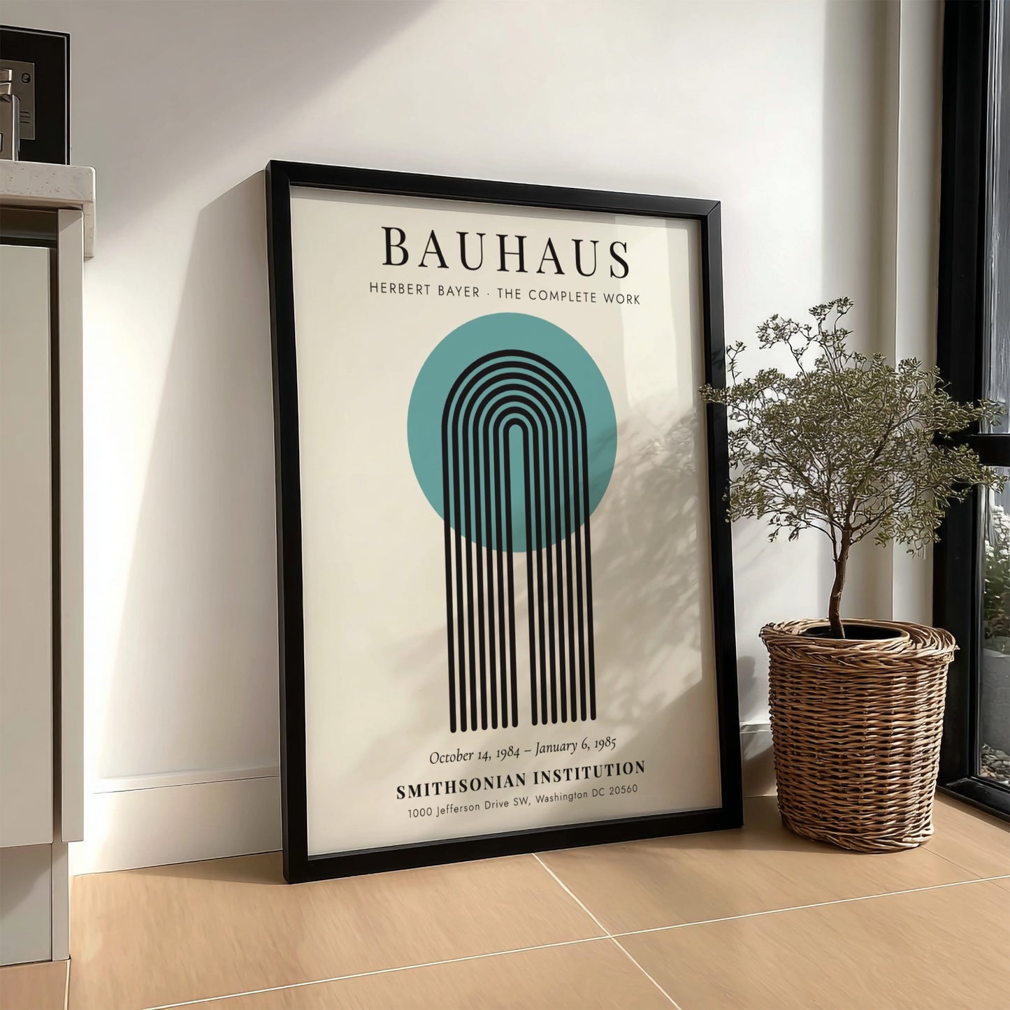 Bauhaus poster featuring Herbert Bayer's design with geometric shapes and vibrant colors