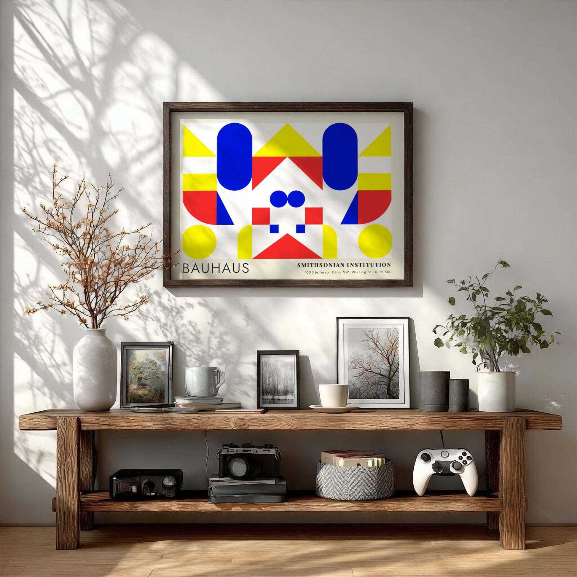 Bauhaus exhibition poster featuring geometric shapes in yellow red and blue by Herbert Bayer