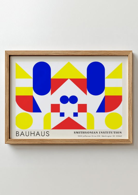 Bauhaus exhibition poster featuring geometric shapes in yellow red and blue by Herbert Bayer