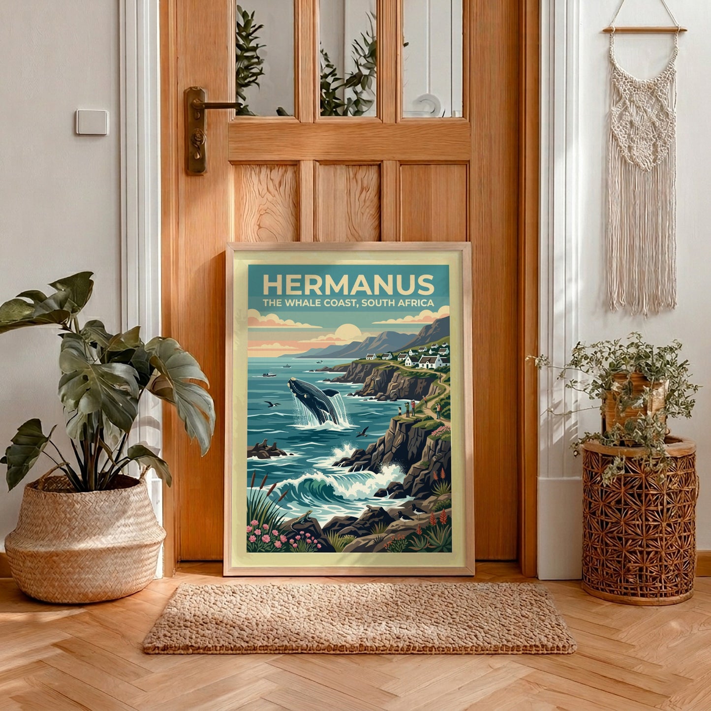 Travel poster of Hermanus, South Africa, featuring a breaching whale near coastal cliffs.