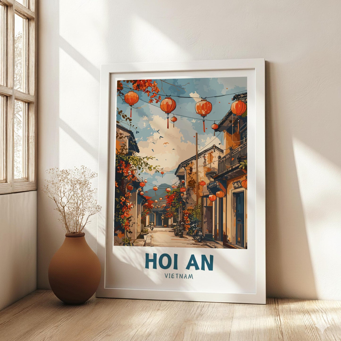 Framed artwork of Hoi An, Vietnam with lanterns hanging above a street.