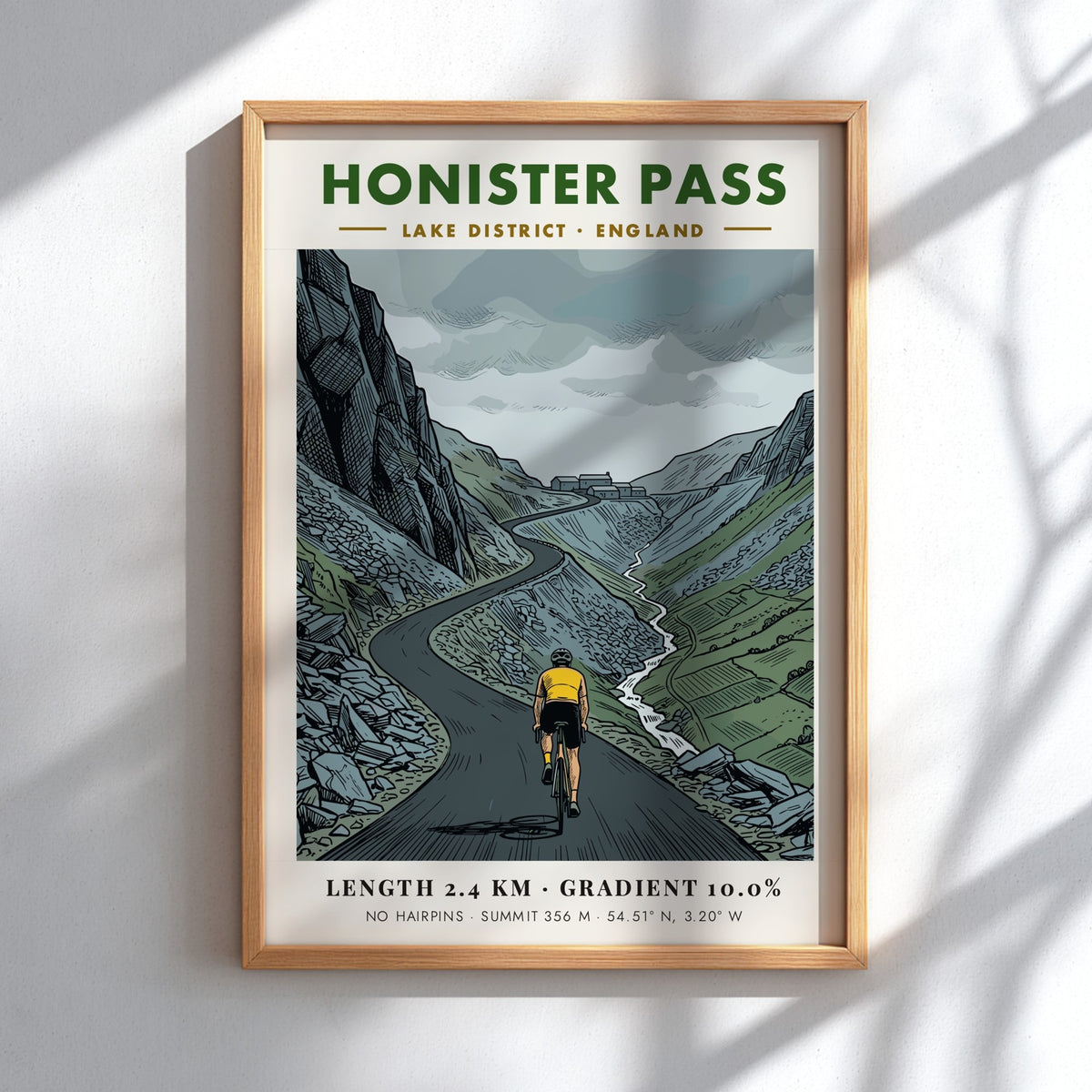 Cycling poster of Honister Pass in the Lake District featuring a determined rider.