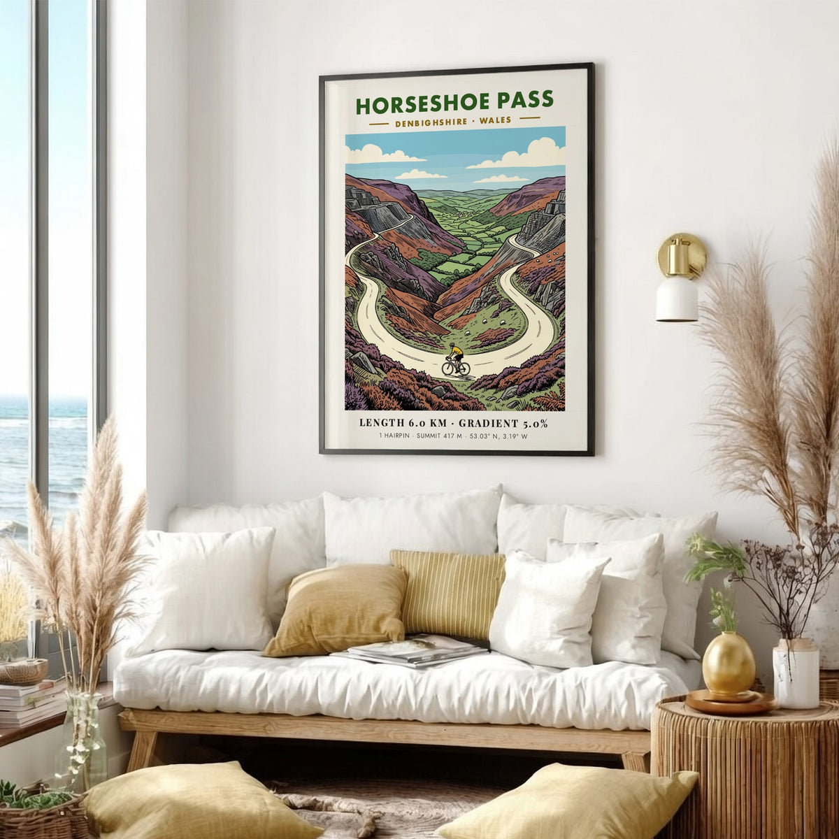 Poster of Horseshoe Pass in Denbighshire featuring a cyclist on a winding road