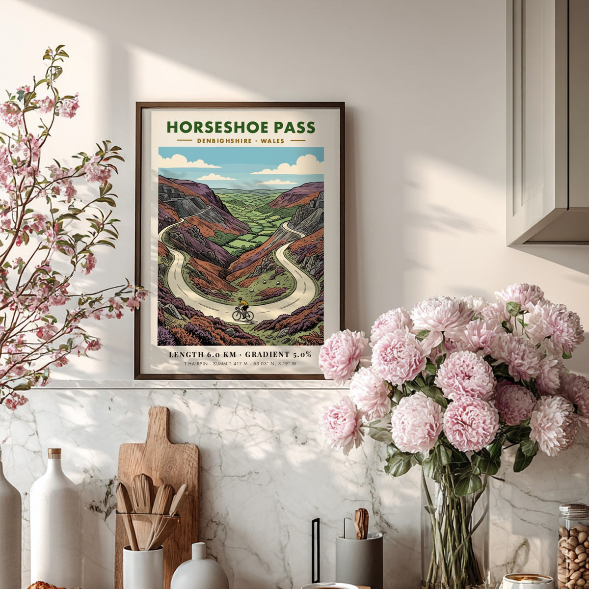 Poster of Horseshoe Pass in Denbighshire featuring a cyclist on a winding road