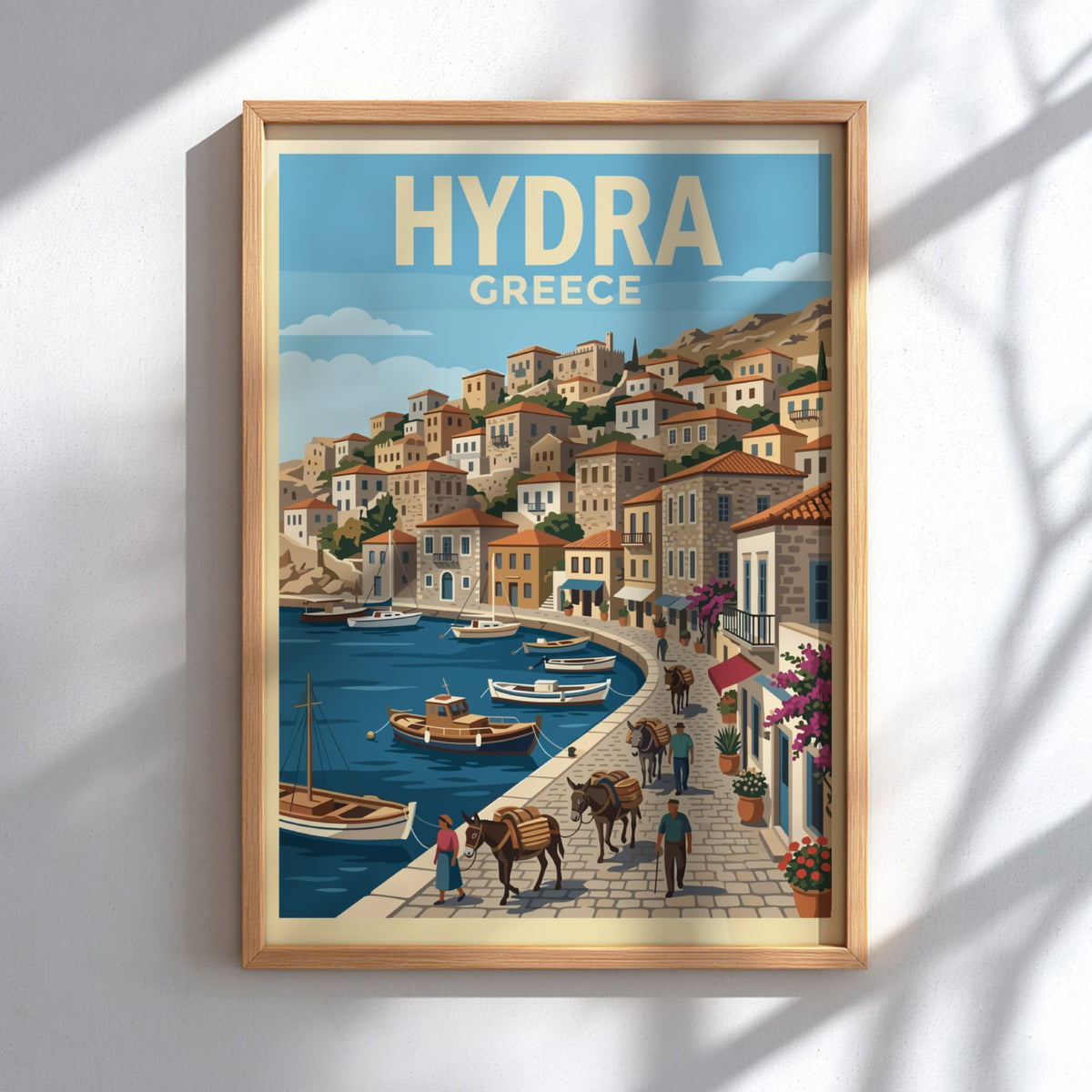 Hydra Greece travel poster featuring stone buildings, a blue harbor, and donkeys on a cobblestone path.