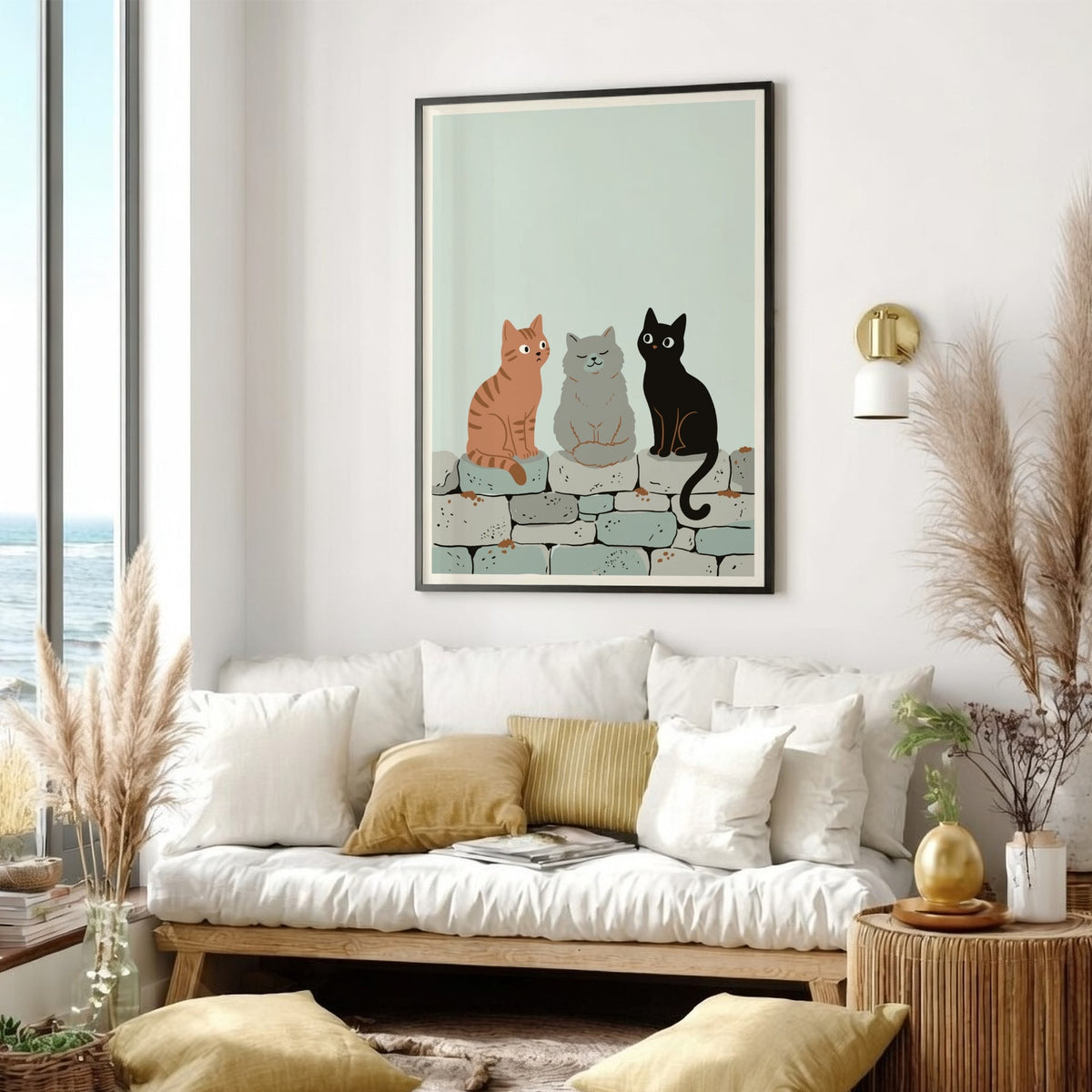 Poster featuring three cats in ginger, grey, and black sitting on a stone wall.