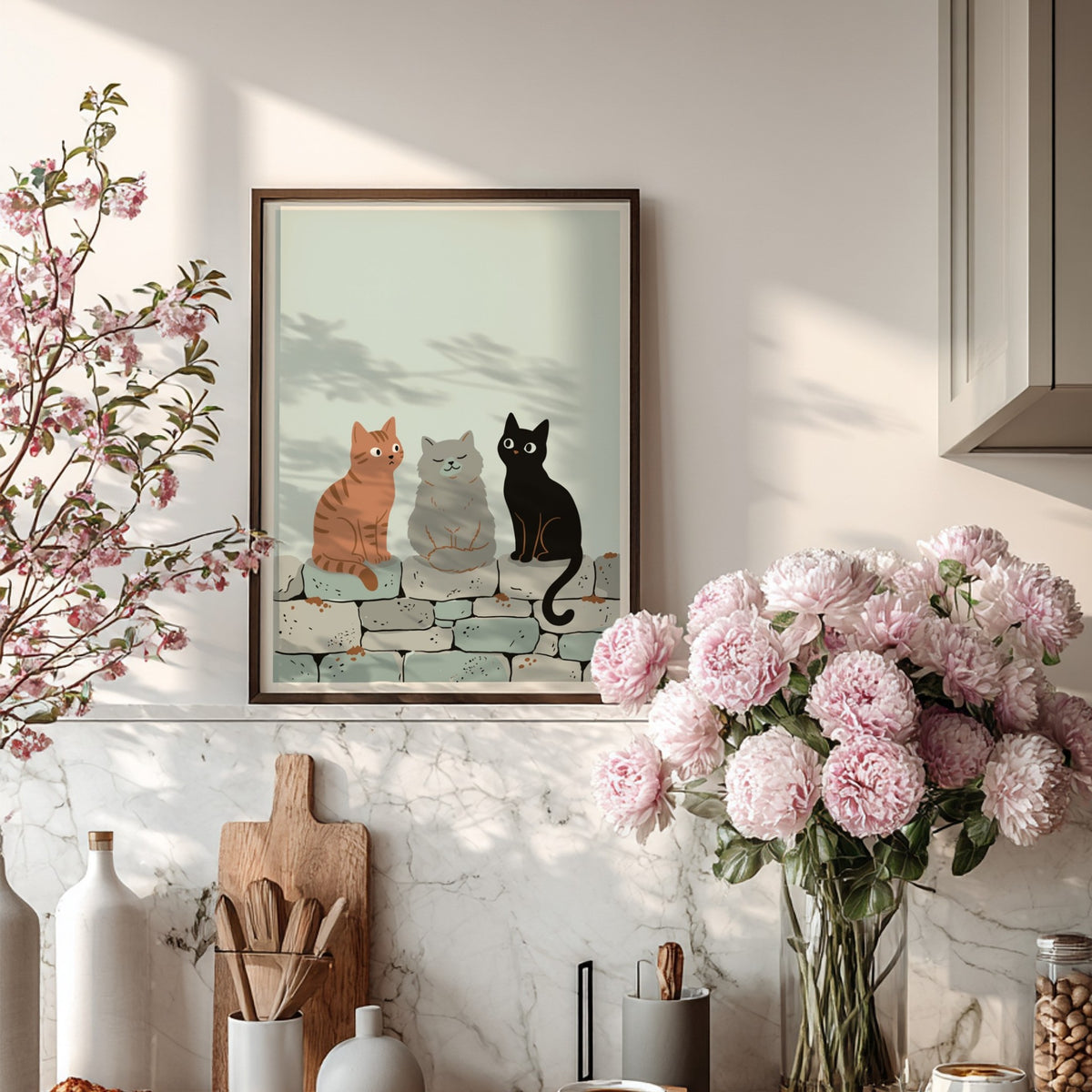 Poster featuring three cats in ginger, grey, and black sitting on a stone wall.