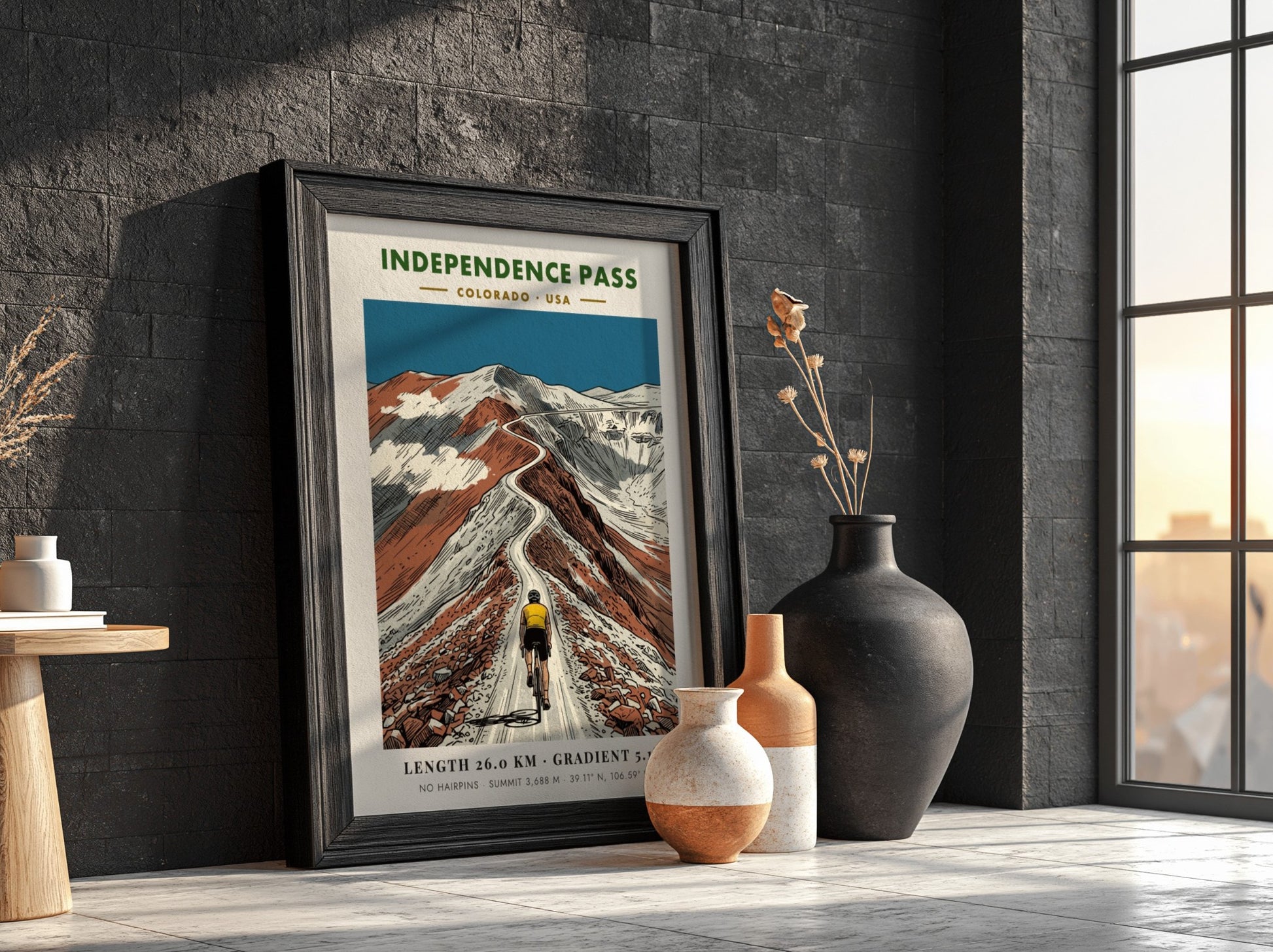 Poster of a cyclist climbing the winding Independence Pass road in Colorado mountains