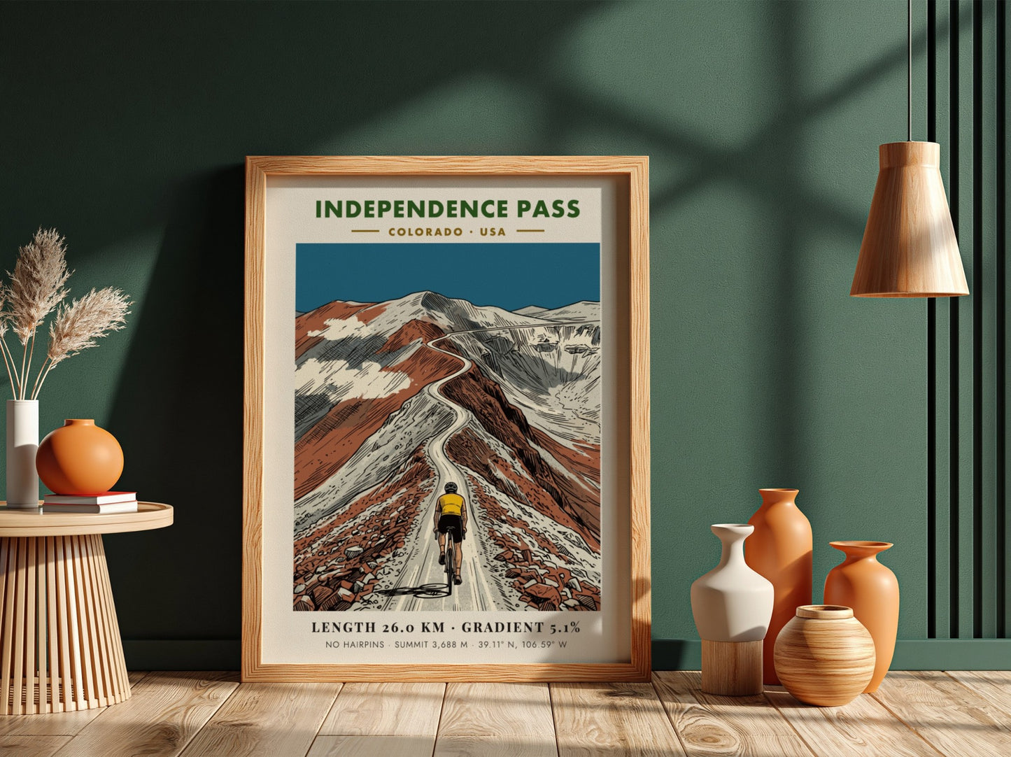Poster of a cyclist climbing the winding Independence Pass road in Colorado mountains