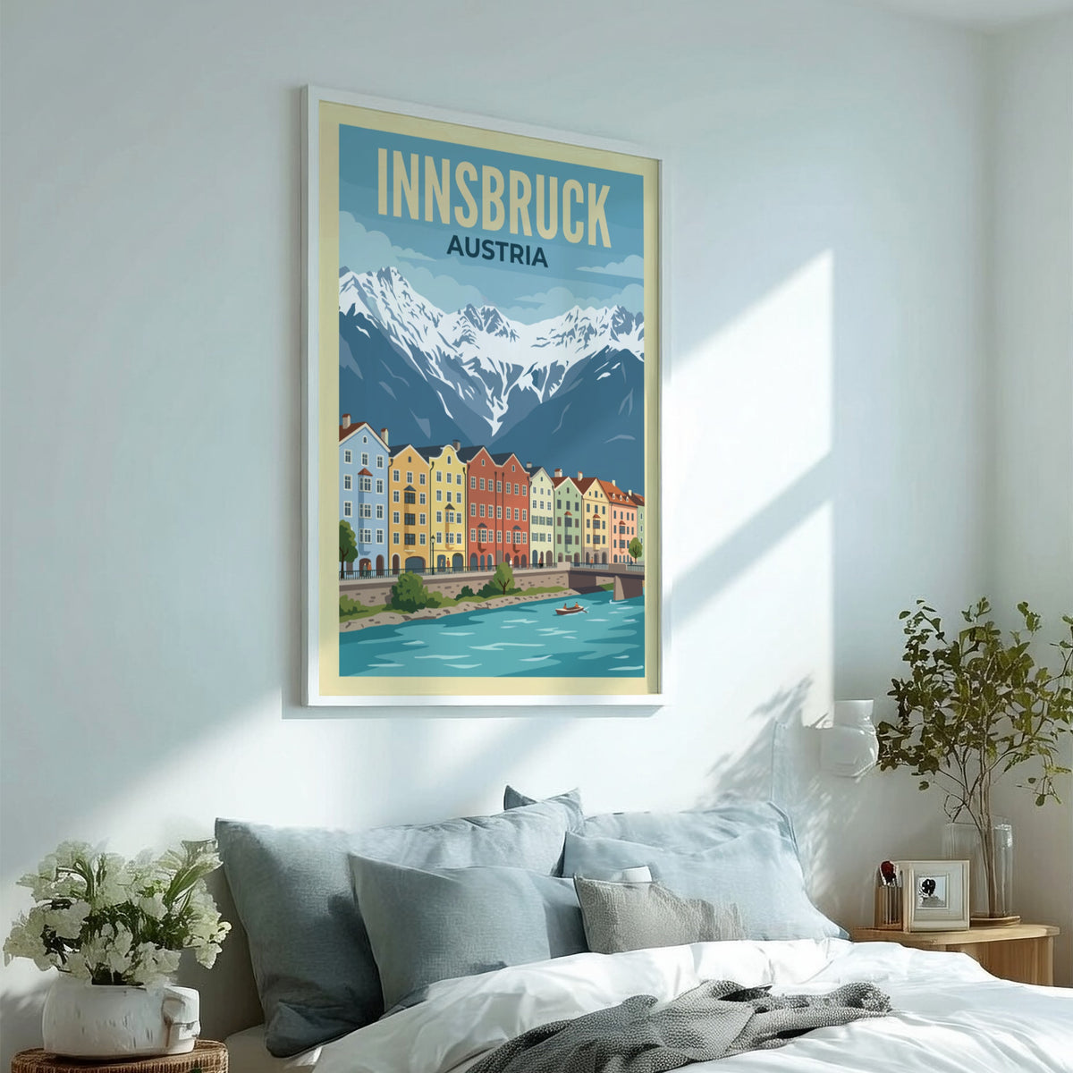 Innsbruck Austria travel poster featuring colourful townhouses along a river with snowy mountains.