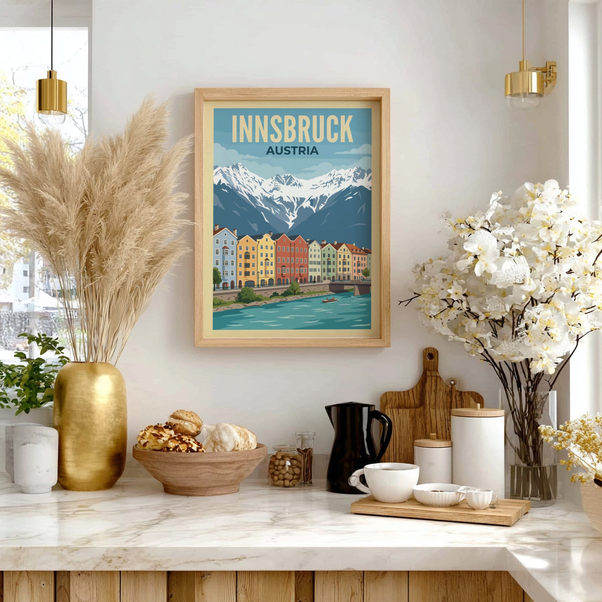 Innsbruck Austria travel poster featuring colourful townhouses along a river with snowy mountains.