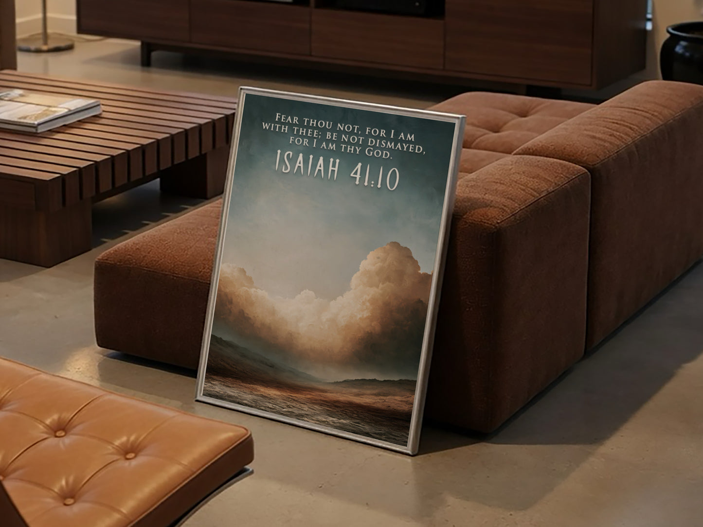 Poster featuring Isaiah 41:10 text over a serene desert landscape with cloudy skies.