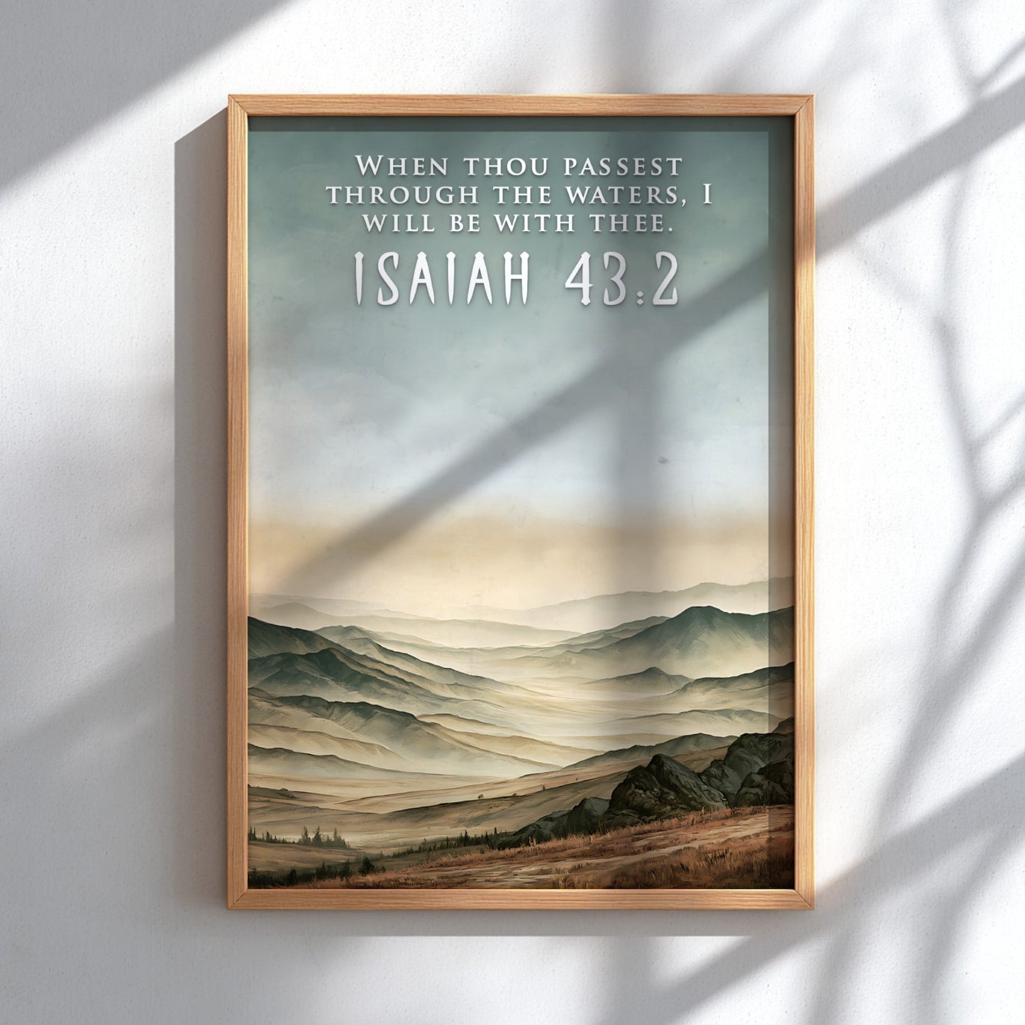 Poster of a misty mountain range with the bible verse Isaiah 43:2 displayed