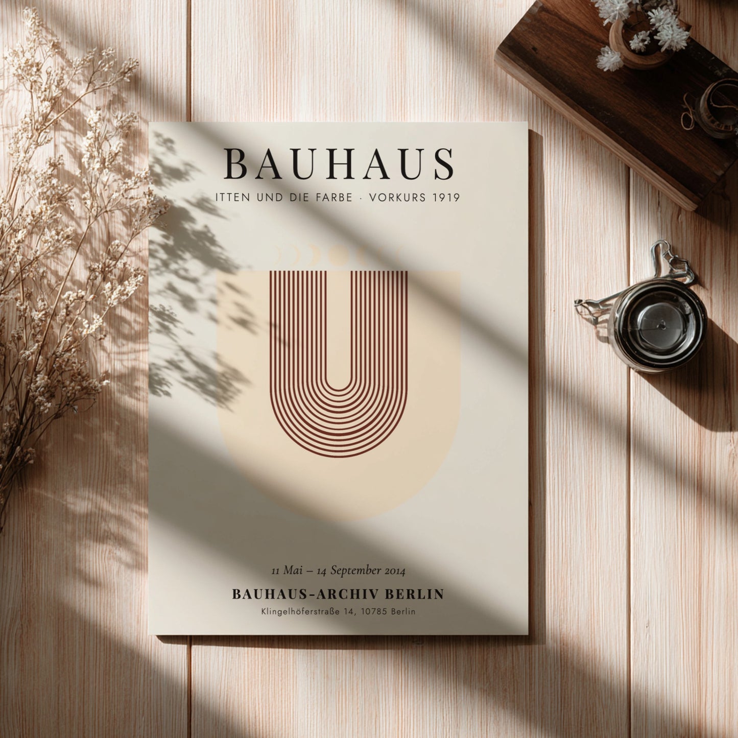 Bauhaus poster featuring geometric shapes and warm colors, inspired by Itten's color theory.