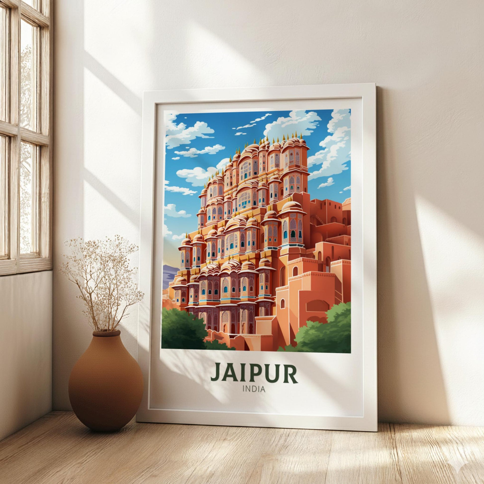 Framed poster of Jaipur, India with a building on a wall.