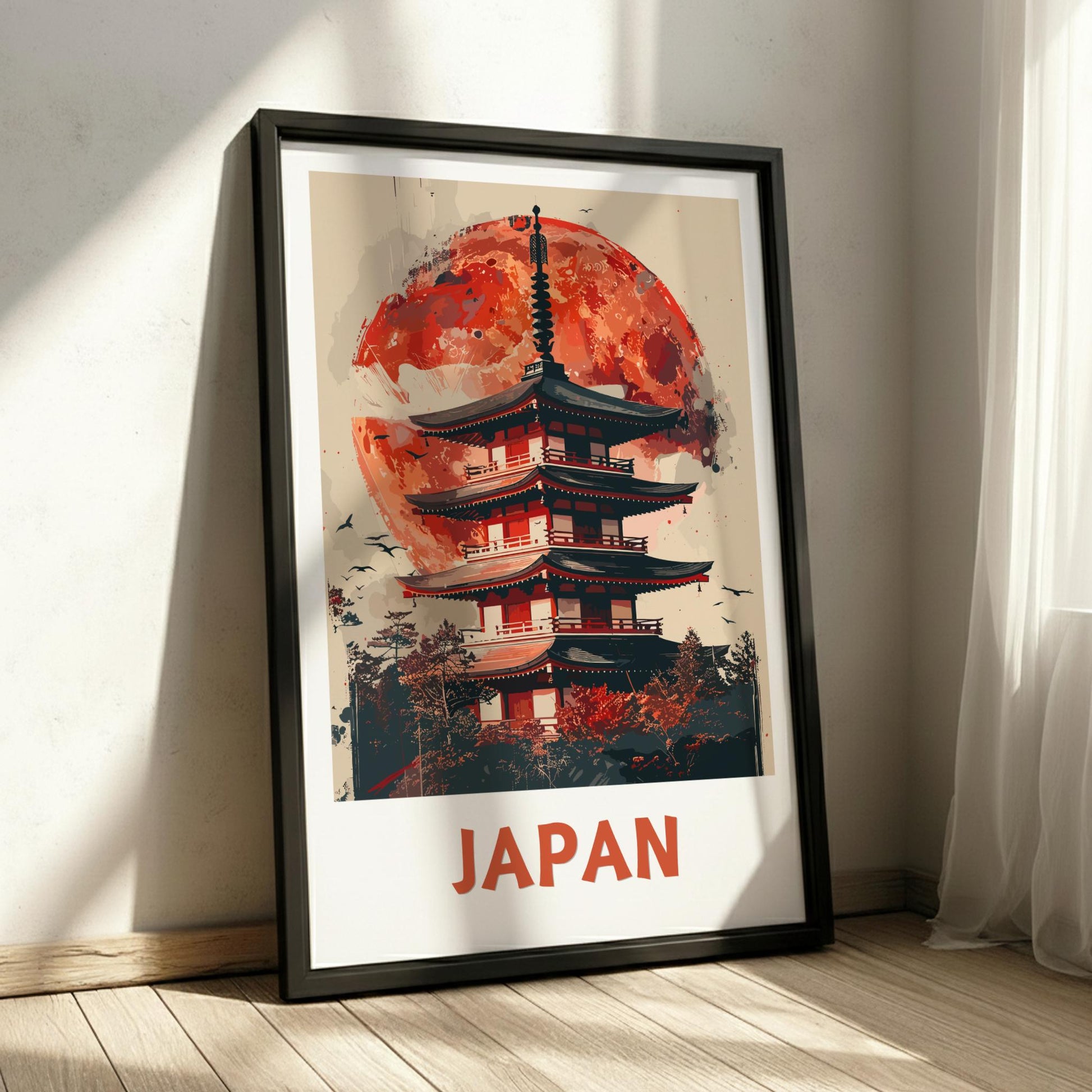Framed poster of a Japanese temple with a red moon in a room with sunlight filtering through curtains.