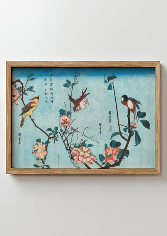 Japanese birds and flowers poster featuring vintage woodblock print style with soft blues and vibrant florals.