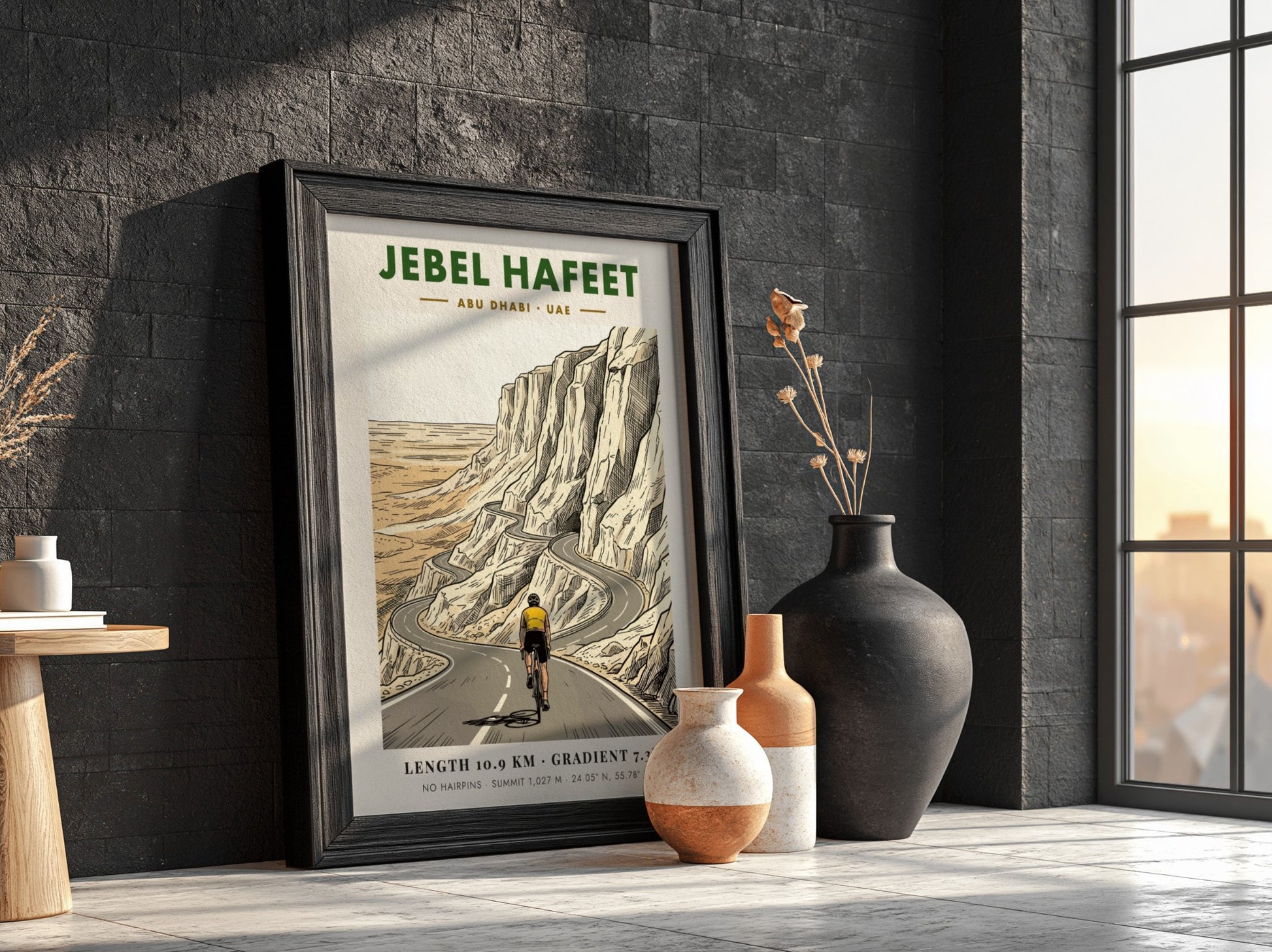 Poster of a cyclist riding up the winding Jebel Hafeet mountain road in Abu Dhabi